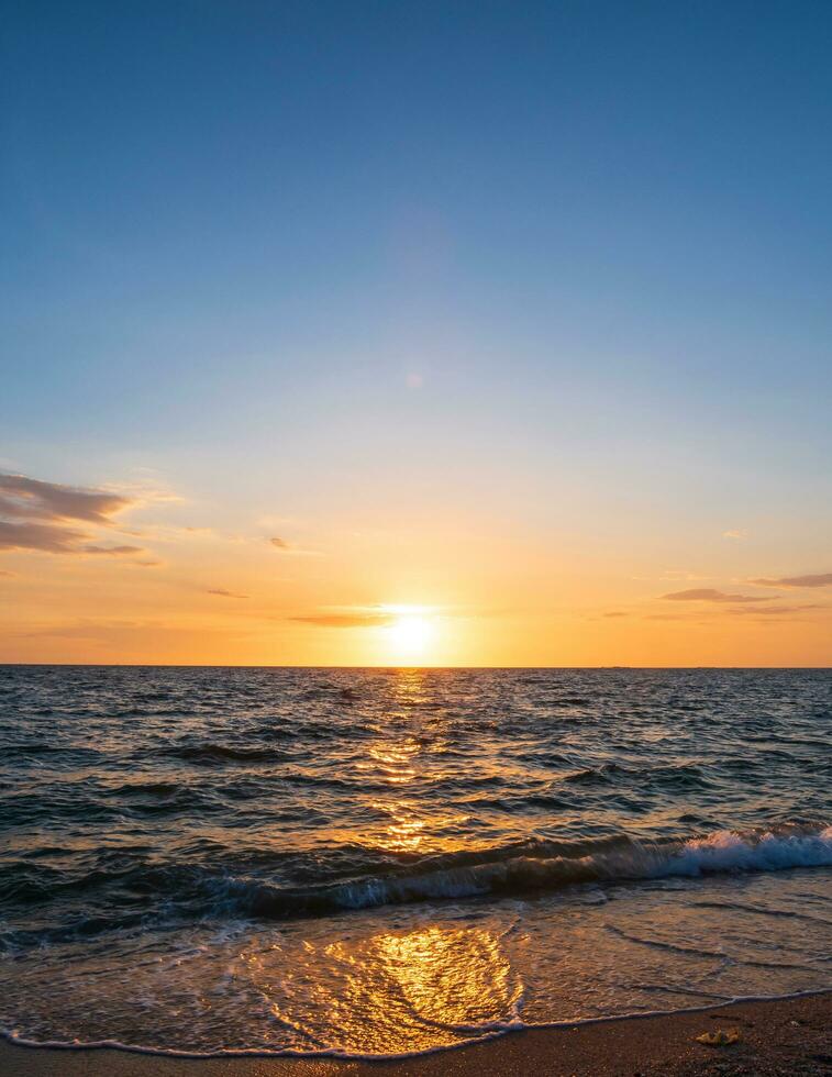 Panorama viewpoint landscape travel summer sea wind wave cool on holiday calm coastal big sun set sky light orange golden Nature tropical Beautiful evening hourday At Bang san Beach Chonburi Thailand. photo