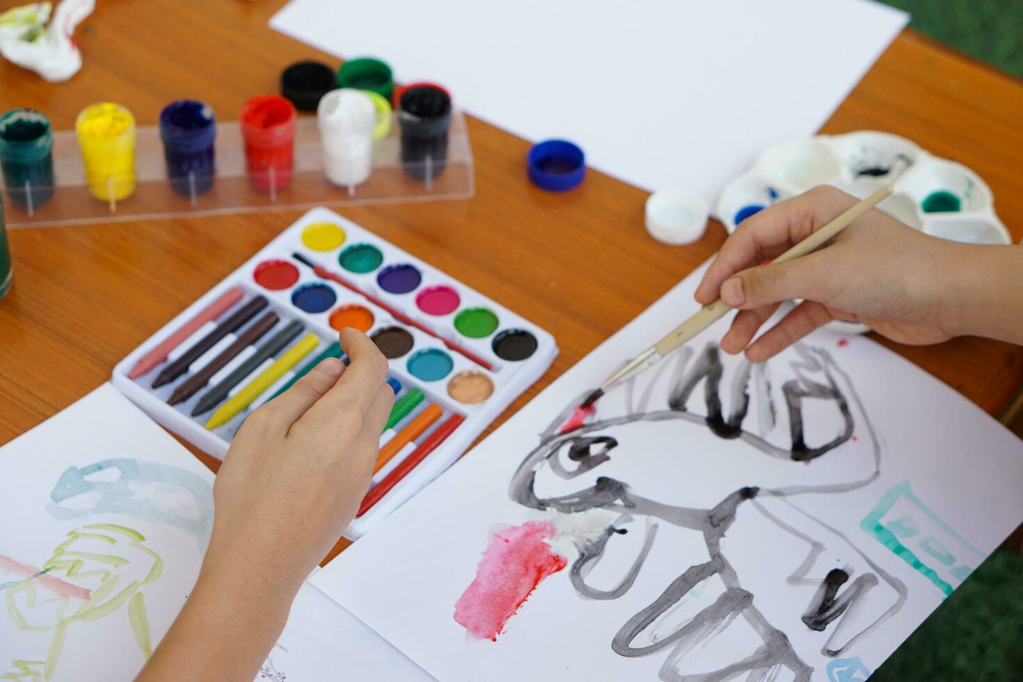 Student is studying art subject, drawing and painting. Concept, art activity. Boy enjoy and concentrate on his favorite activity. Education. Learning by doing, enhance  imagination. photo