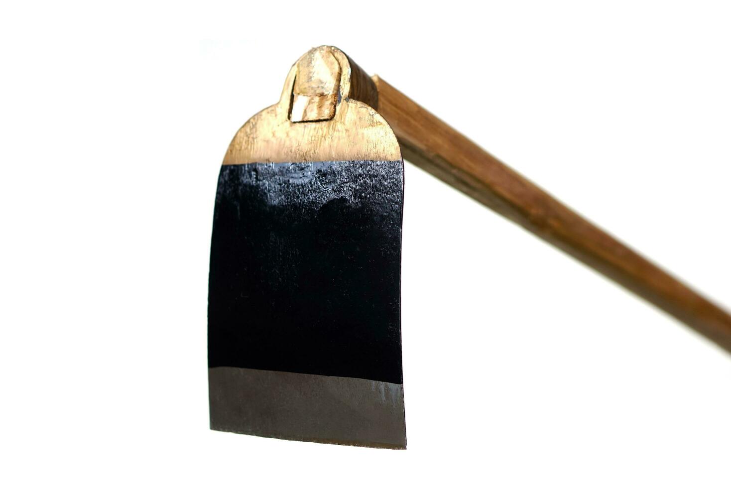 Metal hoe isolated on white background. Concept, gardening tool. Thai farmers use hoe to dig soil for agriculture, get rid of weeds or grass, dig holes for construction. photo