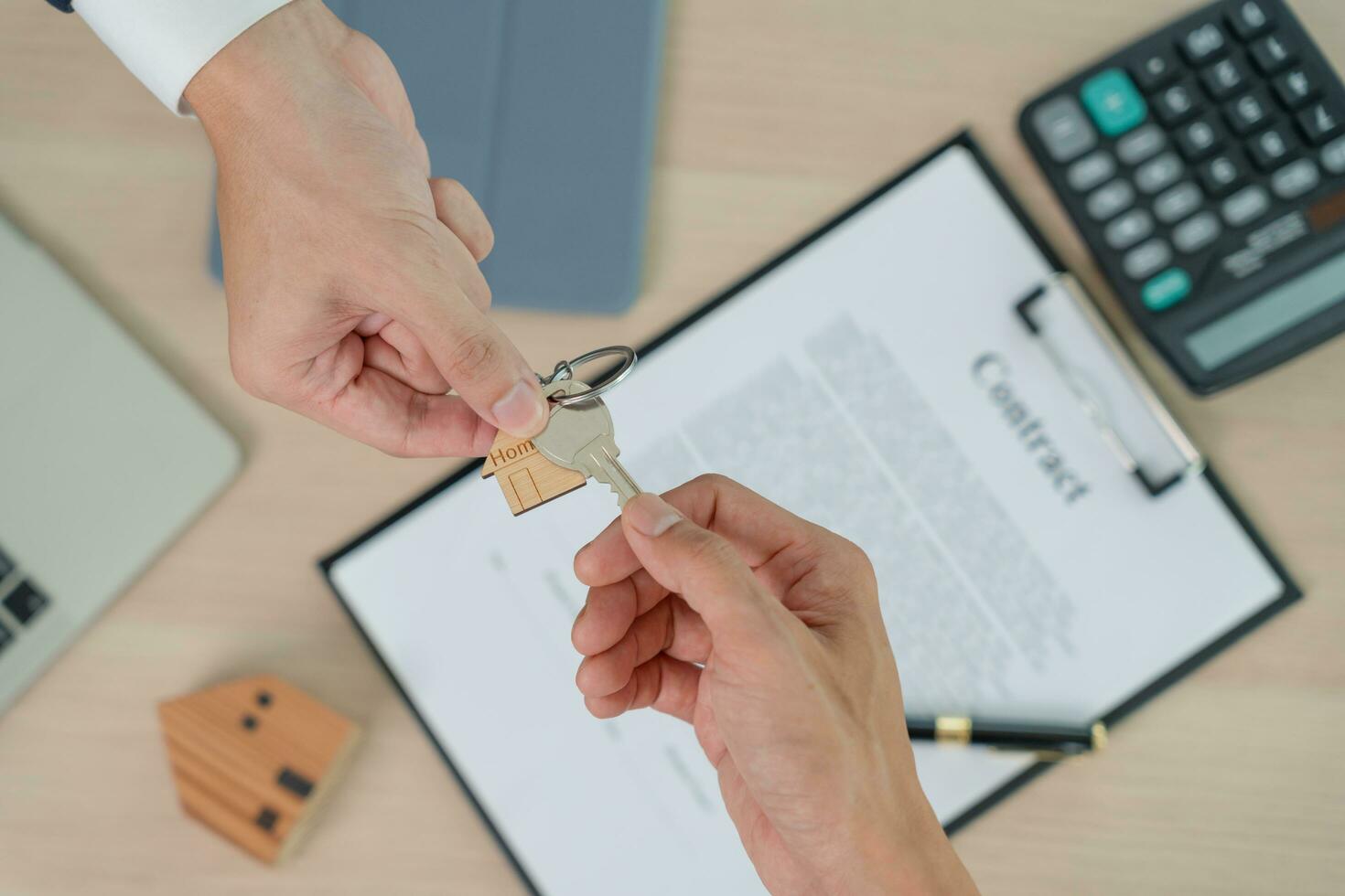 lease, rental and selling home. Real estate agent manager smile holding key for new owner.  rent house, Sales, loan credit financial, insurance, Seller, dealer, installment,  buy, sell, move in photo