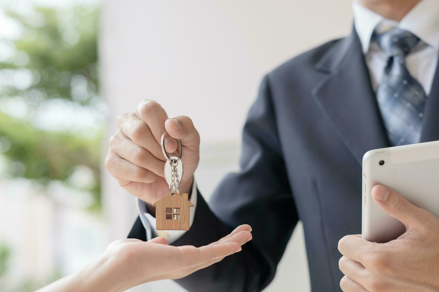 lease, rental and selling home. Dealership manager smile handshake to the new homeowner. rent house, Sales, loan credit financial, insurance, Seller, dealer, installment photo