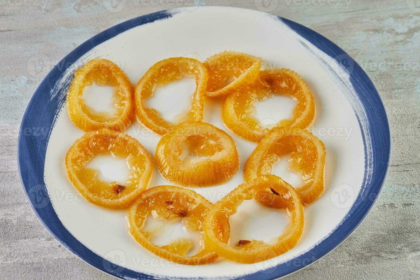 Citrus Zest Fresh lemon wedges on white plate in bright kitchen photo