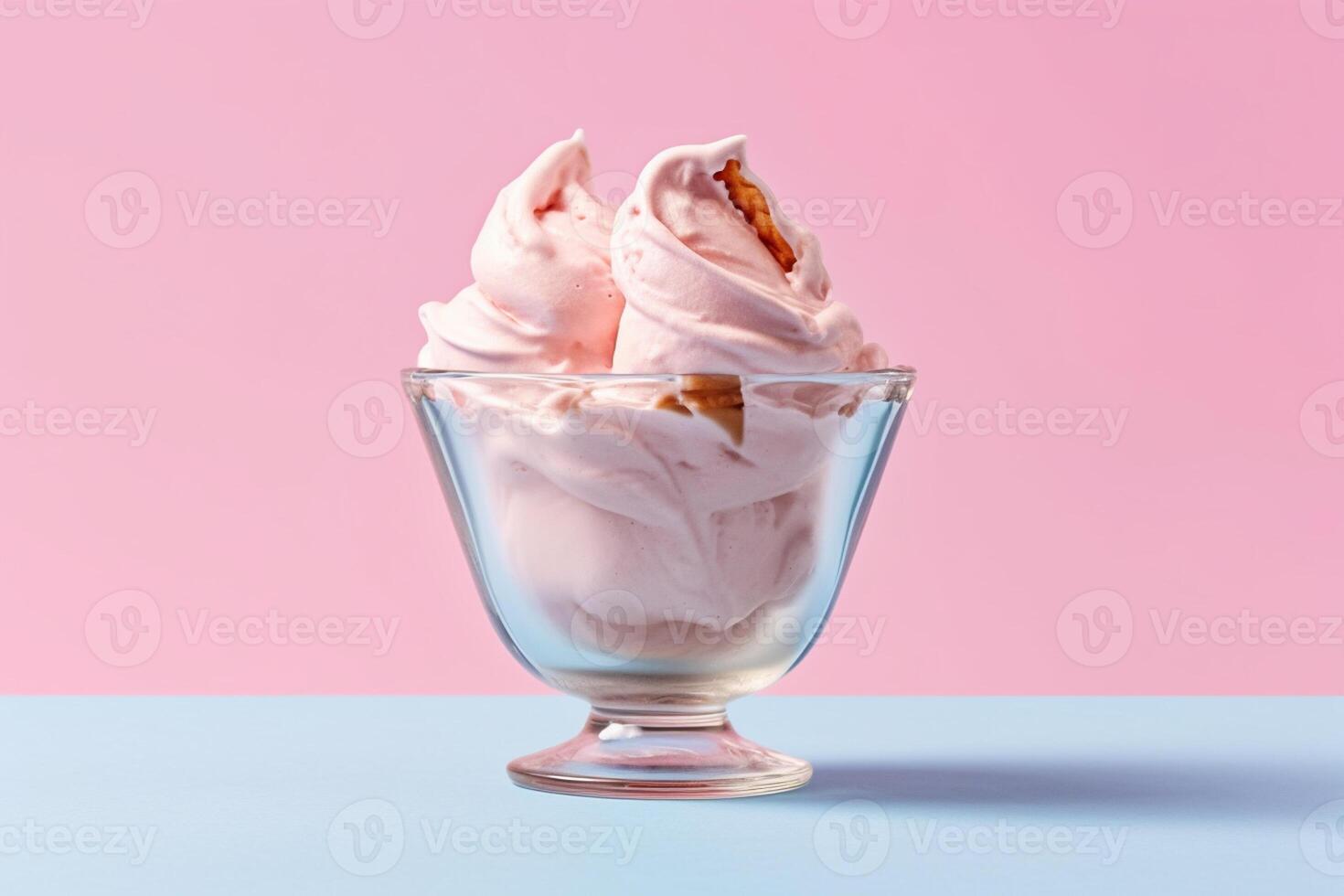 ice cream in a glass bowl on solid color background photo