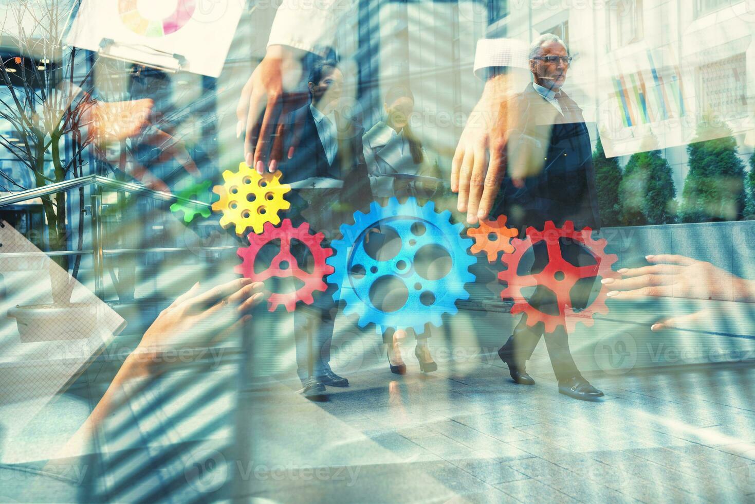 Business team connecting gears. Teamwork, partnership and integration concept. Double exposure photo