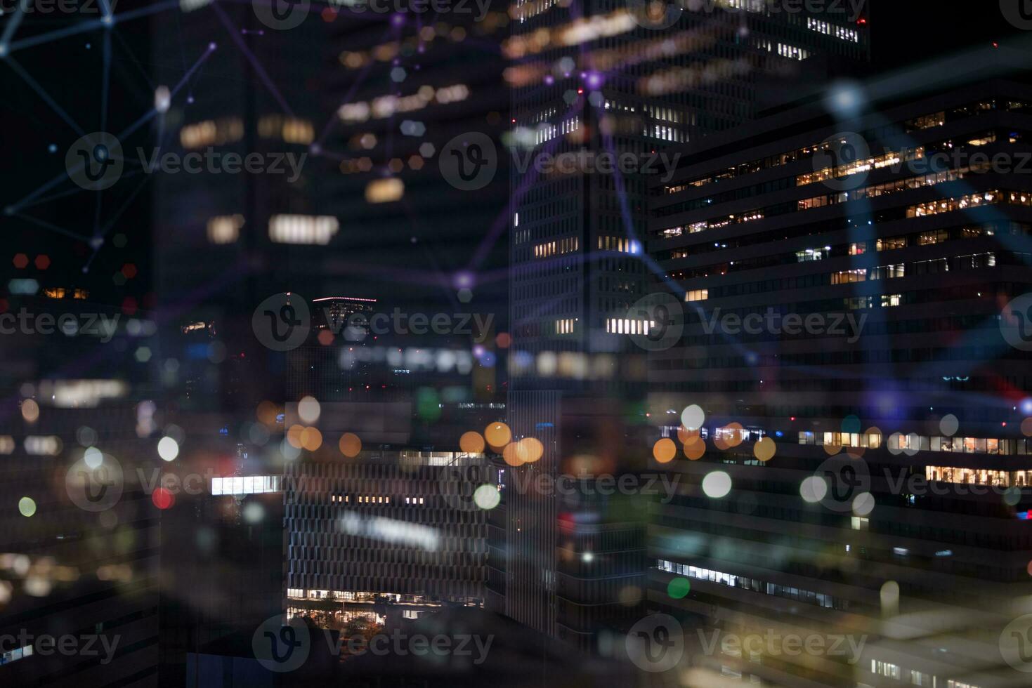 Night view of a skyscraper with internet network effect photo