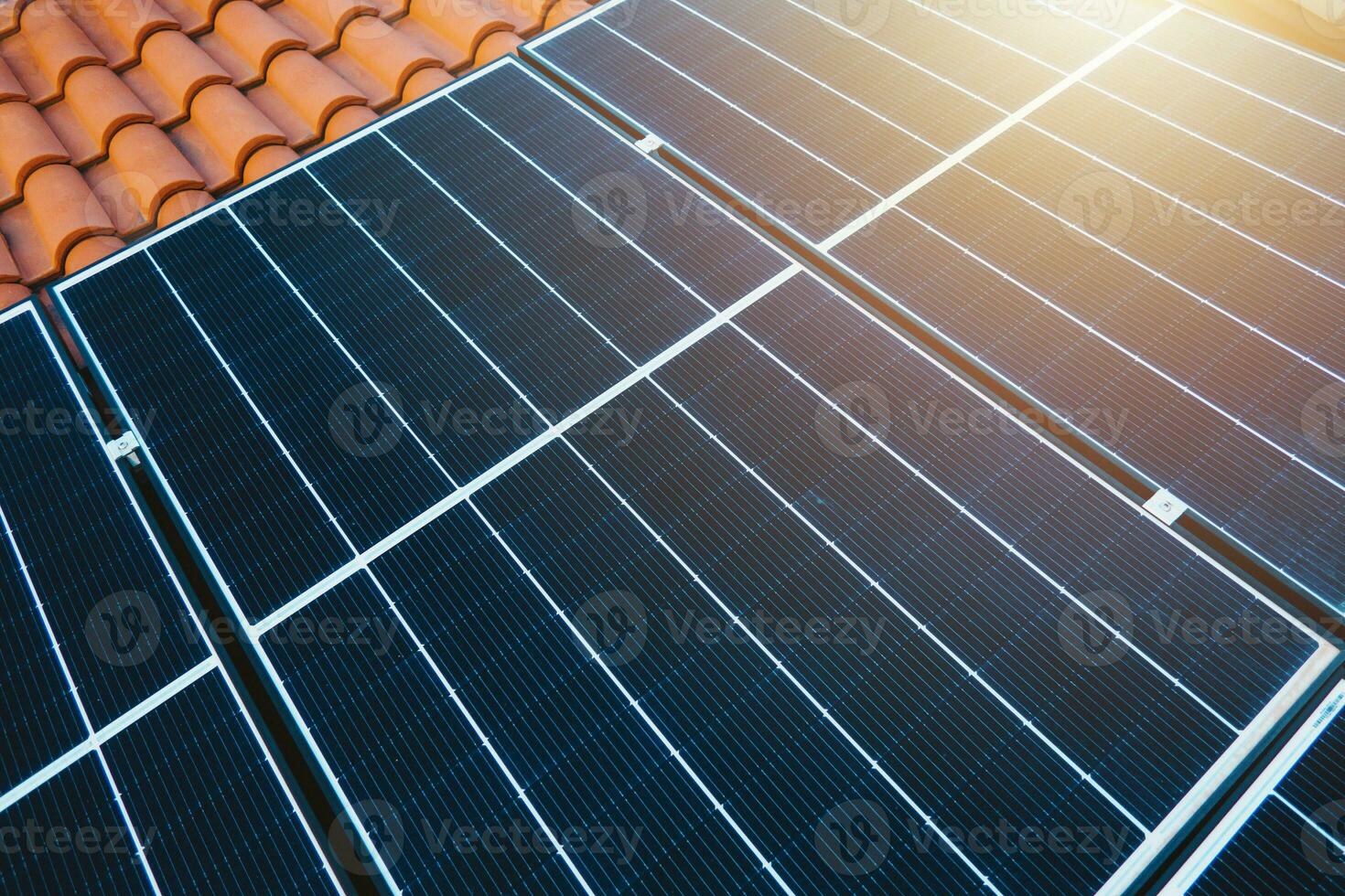 Renewable energy system with solar panel on the roof photo