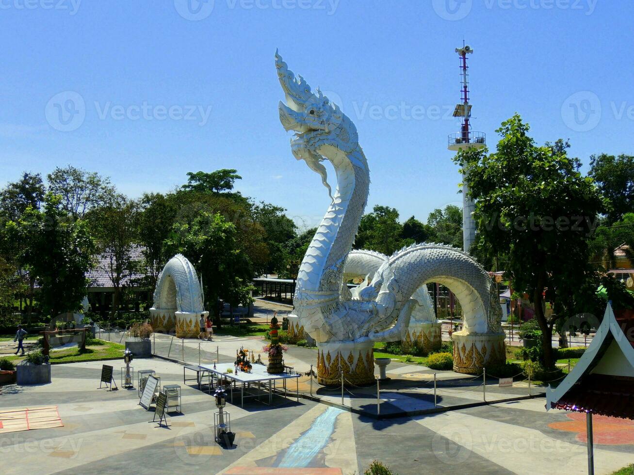 A large white Naga statue or King of Nagas at Kaeng Kabao, Mukdahan photo