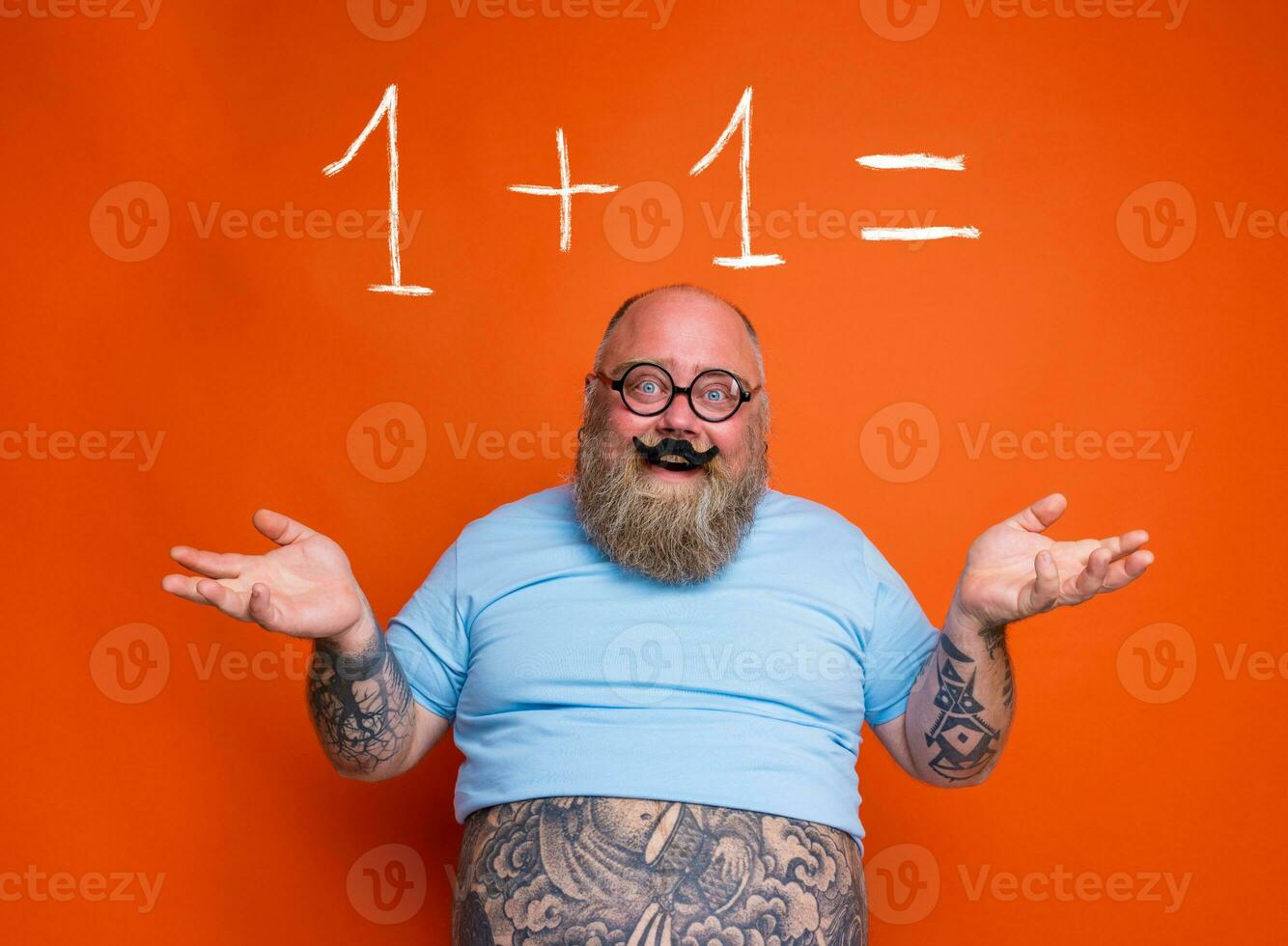 Confused fat thoughtful man acts like a nerd person photo