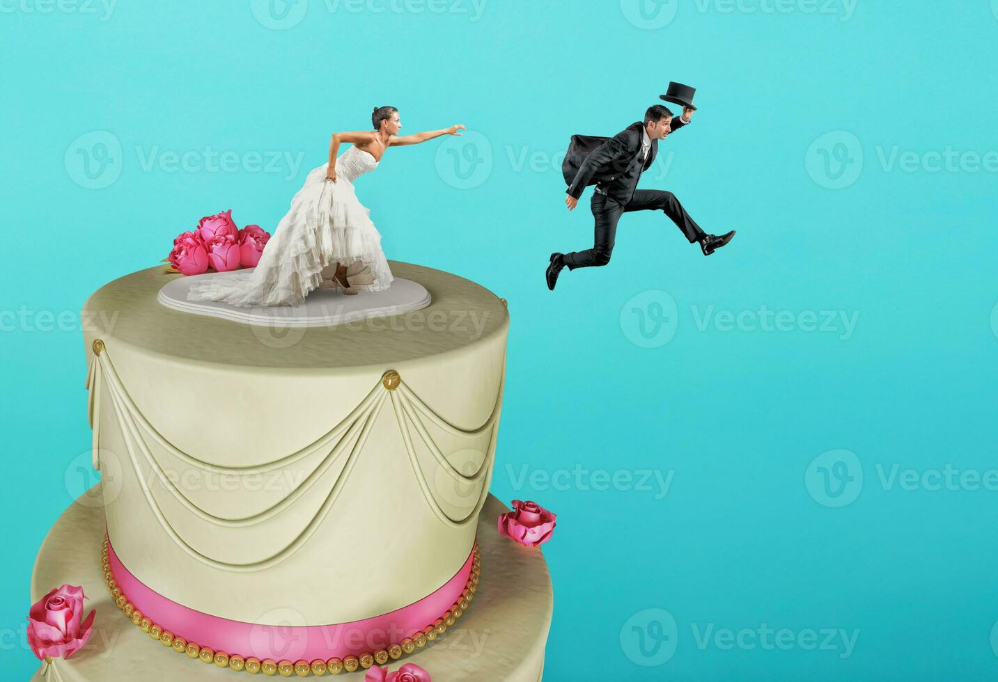 hombre en el pastel parte superior escapa desde matrimonio foto