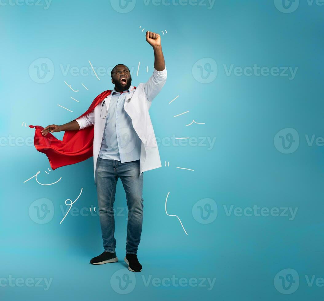 Medic acts like a superhero to fight pandemic of covid19 coronaviruses. Blue background photo