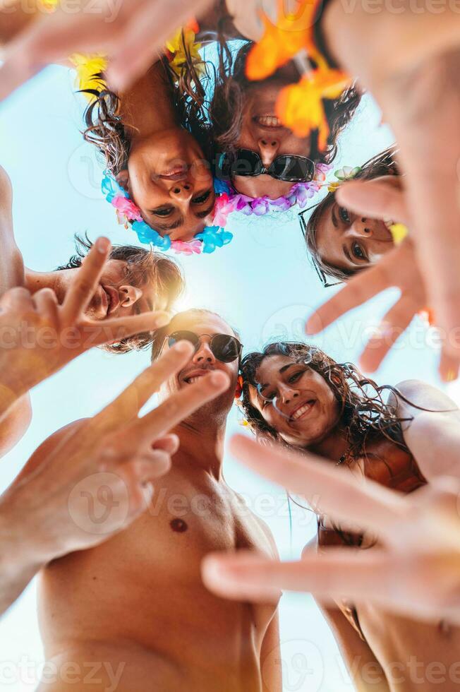 Happy smiling friend enjoy the summer at the swimmingpool photo