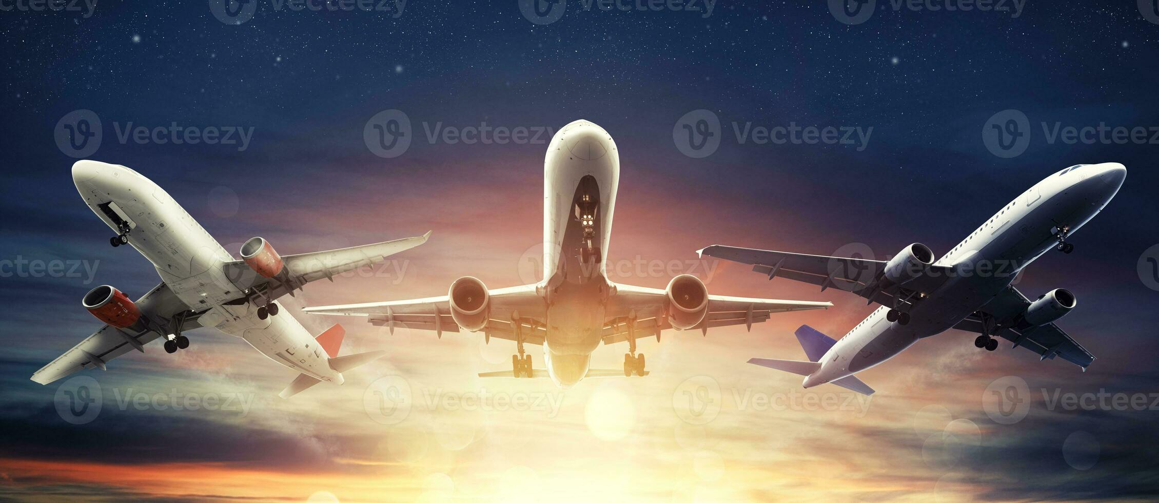Summer holiday and traveling concept with aircrafts in the sky photo