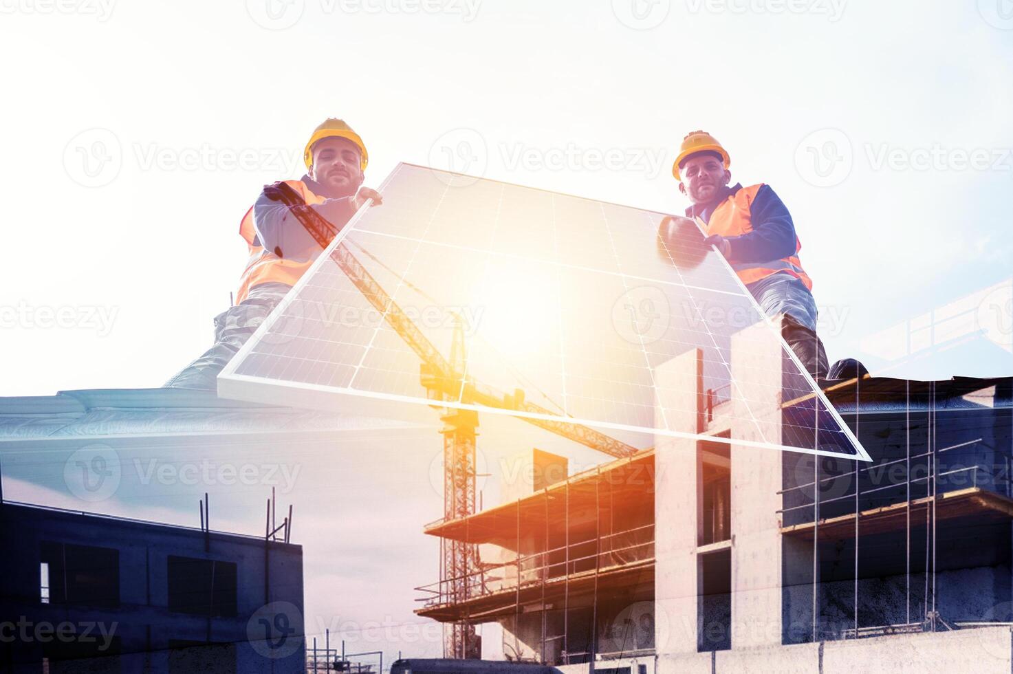 Qualified workers during the installation of photovoltaic systems. photo
