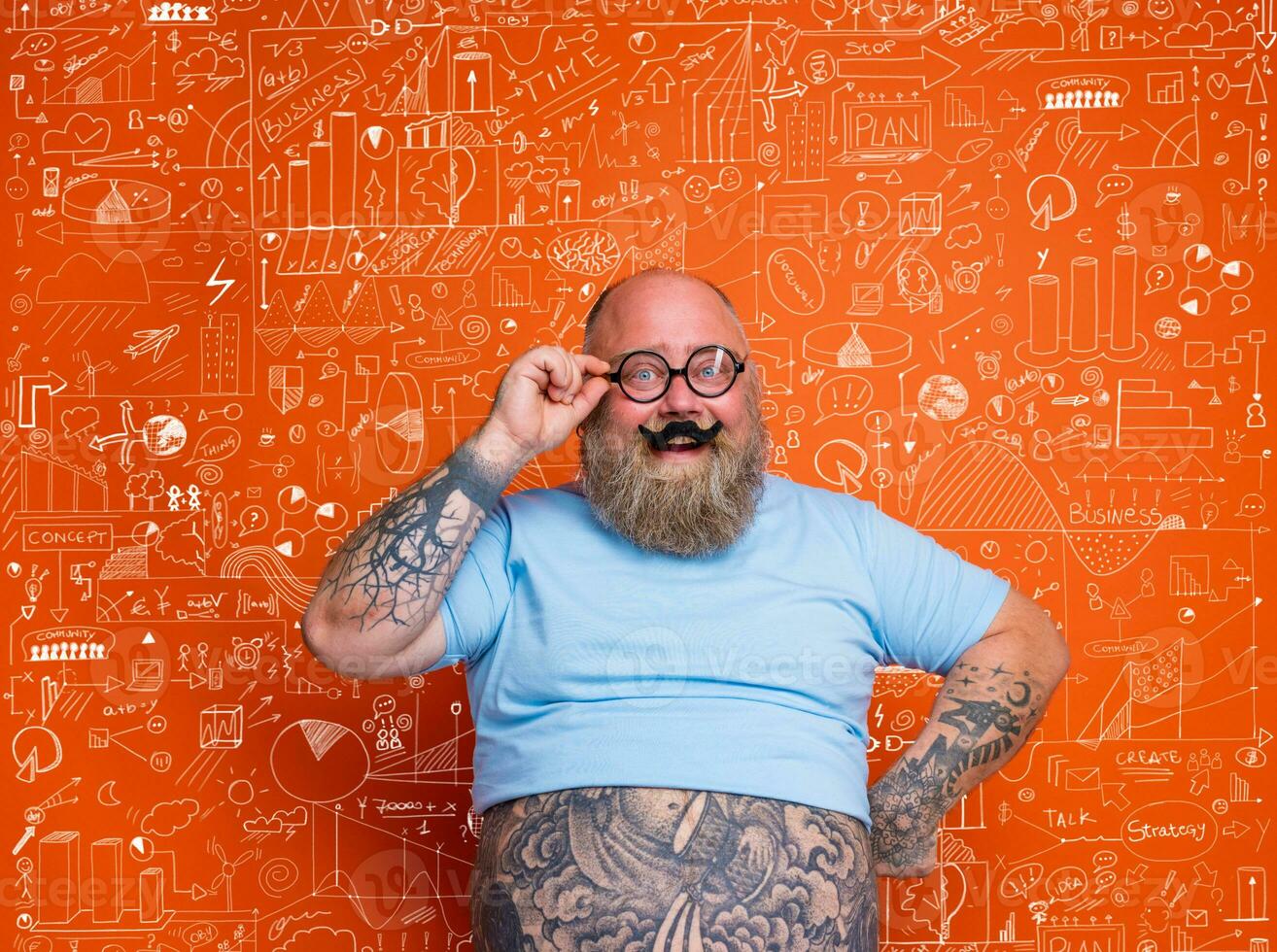 Happy fat man acts like a nerd person photo