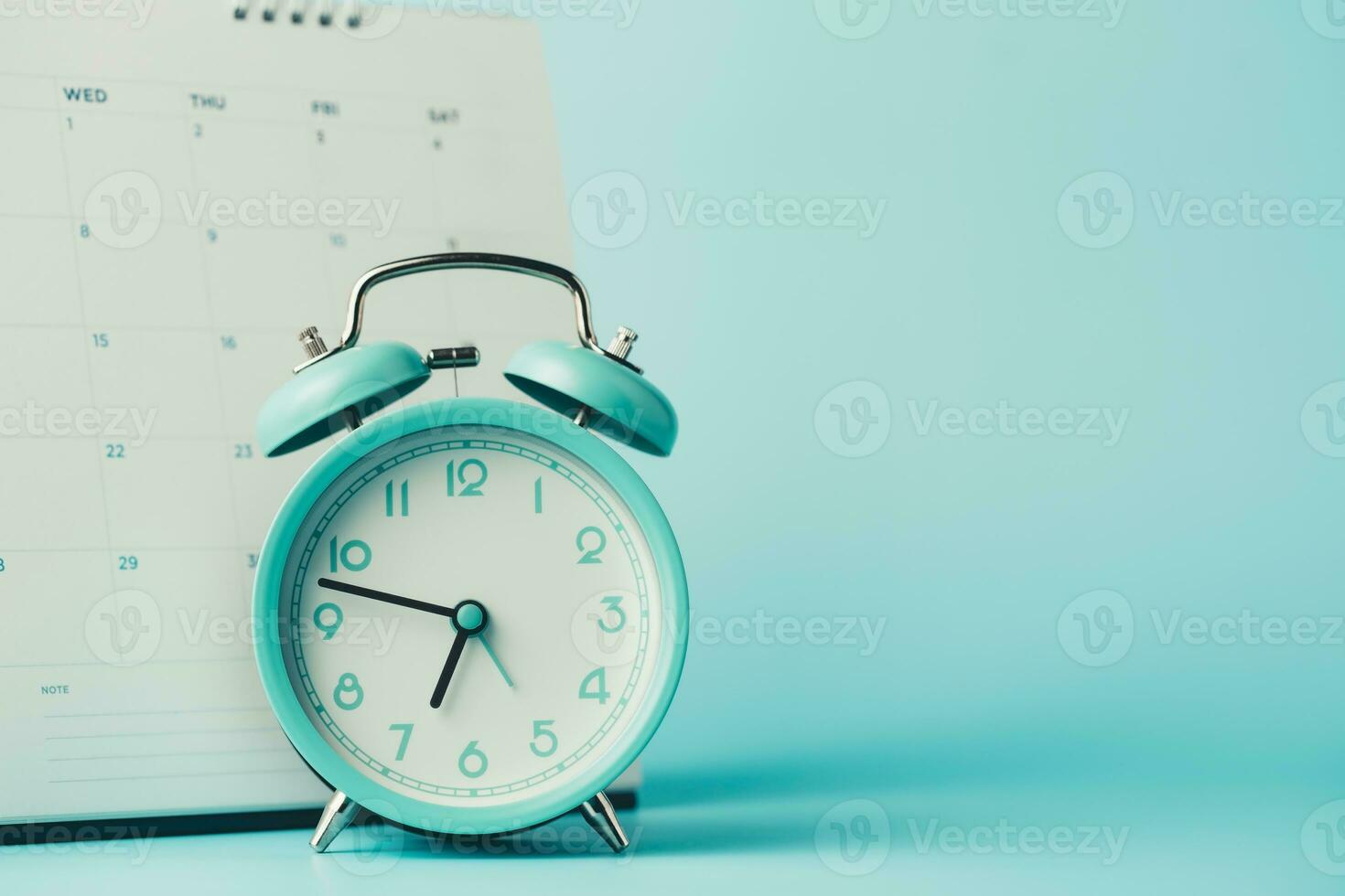 An alarm clock with calendar photo