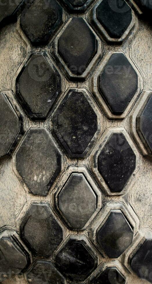 Very wear and tear old tire surface photo