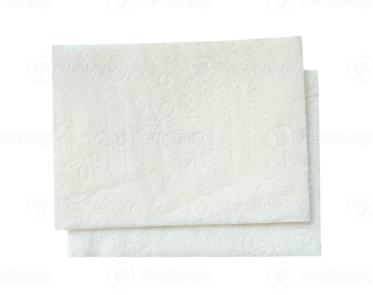 Top view of two folded pieces of white tissue paper or napkin in stack isolated on white background with clipping path. photo