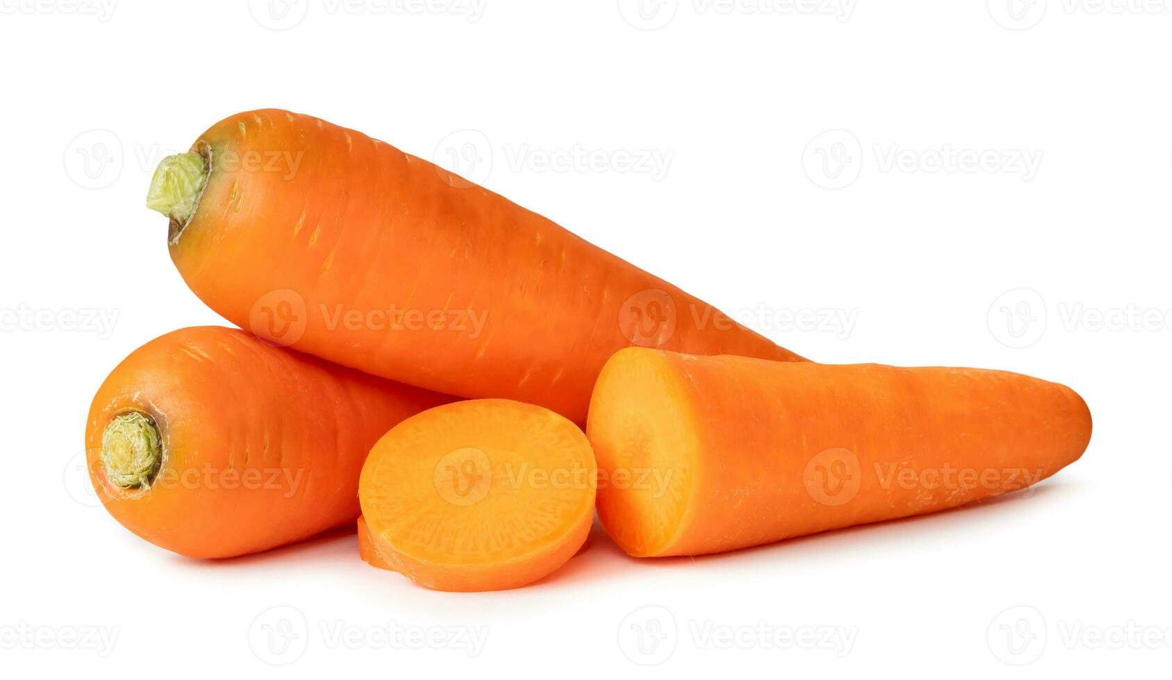 Two fresh orange carrots with slices in stack isolated on white background with clipping path. Close up of healthy vegetable root photo