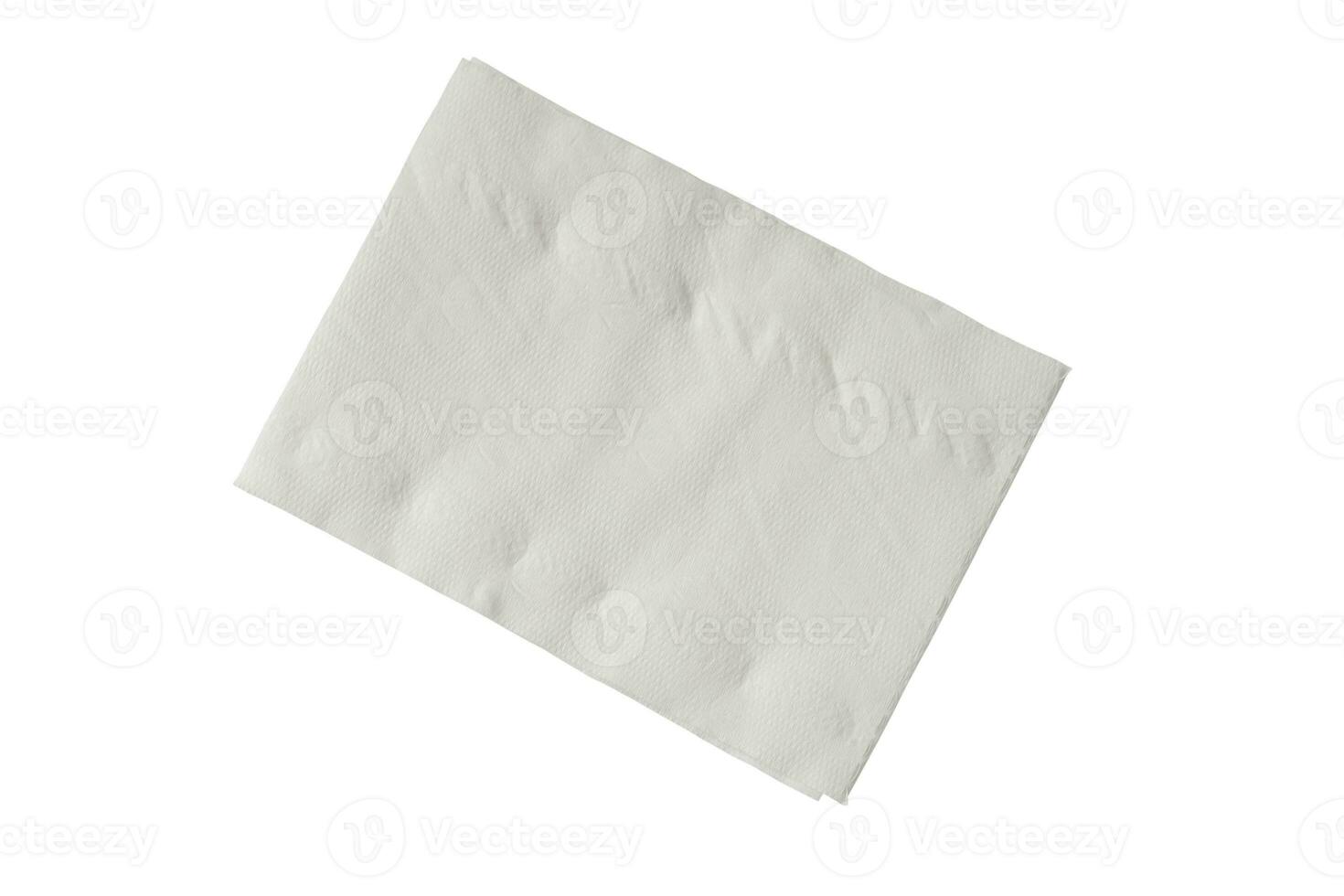 Top view of single folded pieces of white tissue paper or napkin in stack isolated on white background with clipping path. photo