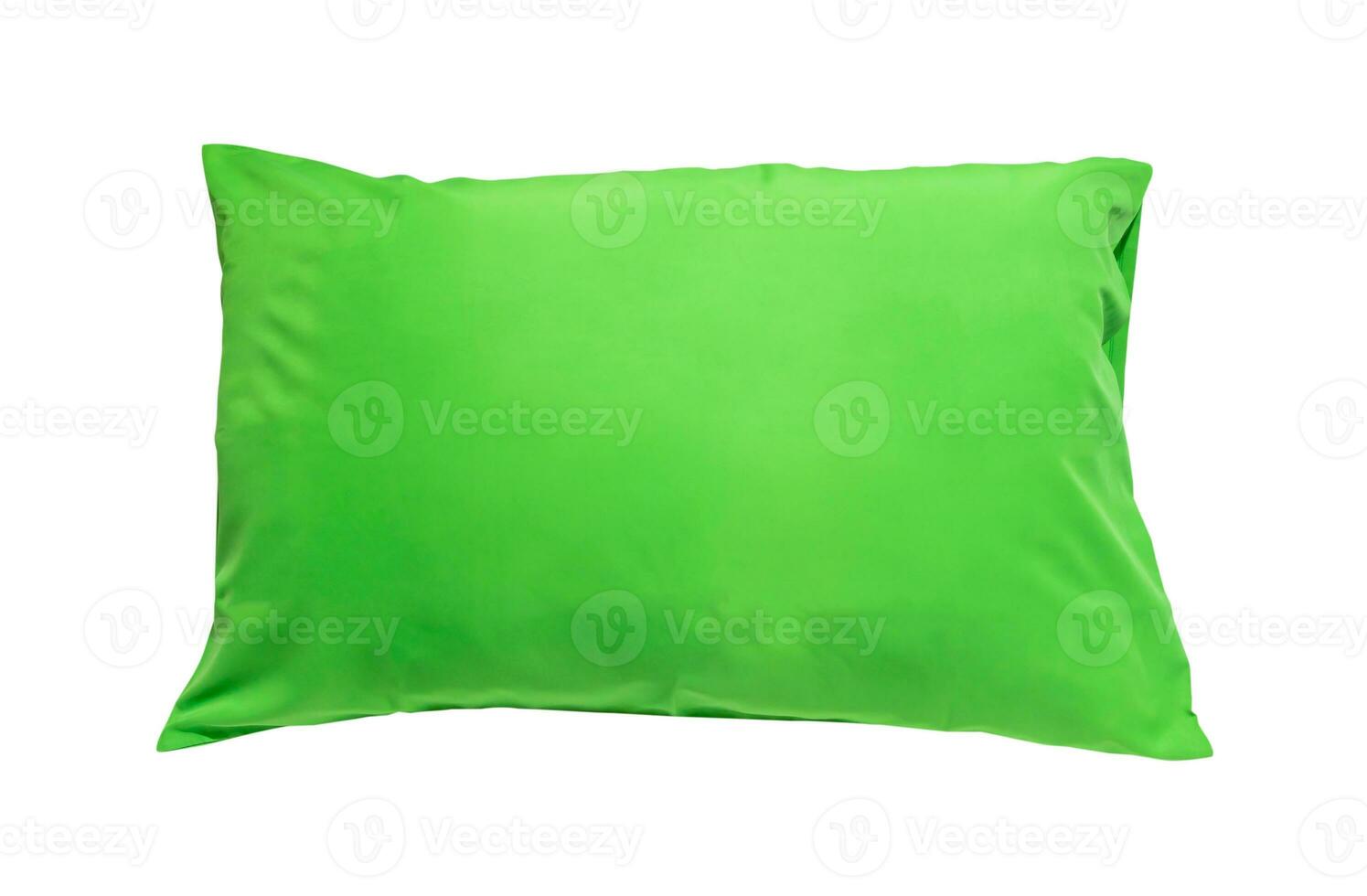 Green pillow after guest's use at hotel or resort room isolated on white background with clipping path. Concept of confortable and happy sleep in daily life photo