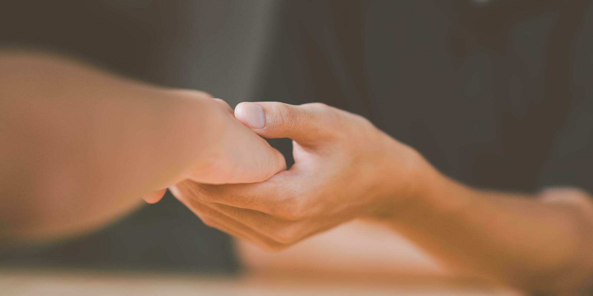 Husband and wife join hands to cheer ,Relationship care concept ,comforting family members ,mutual encouragement ,tenderness ,comfort and sympathy ,helping ,giving hope and believing photo