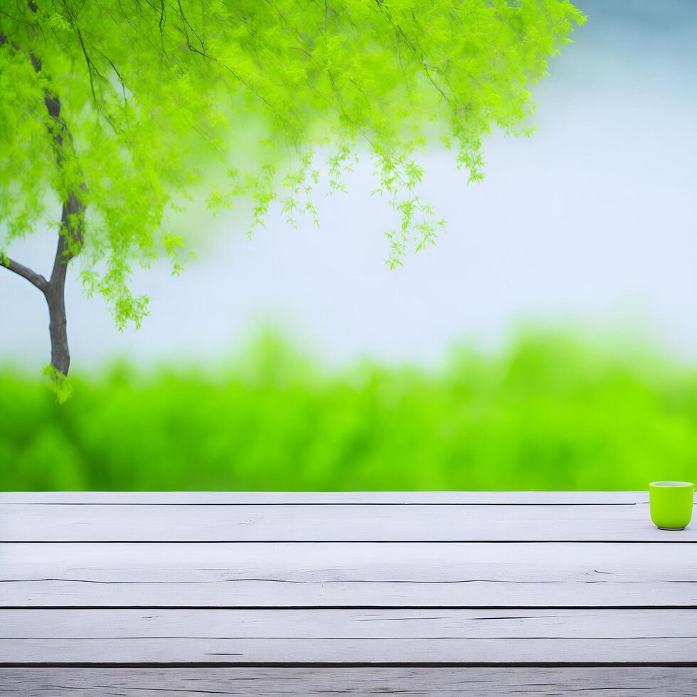 Empty wooden table with blurred green garden background. For product display. photo