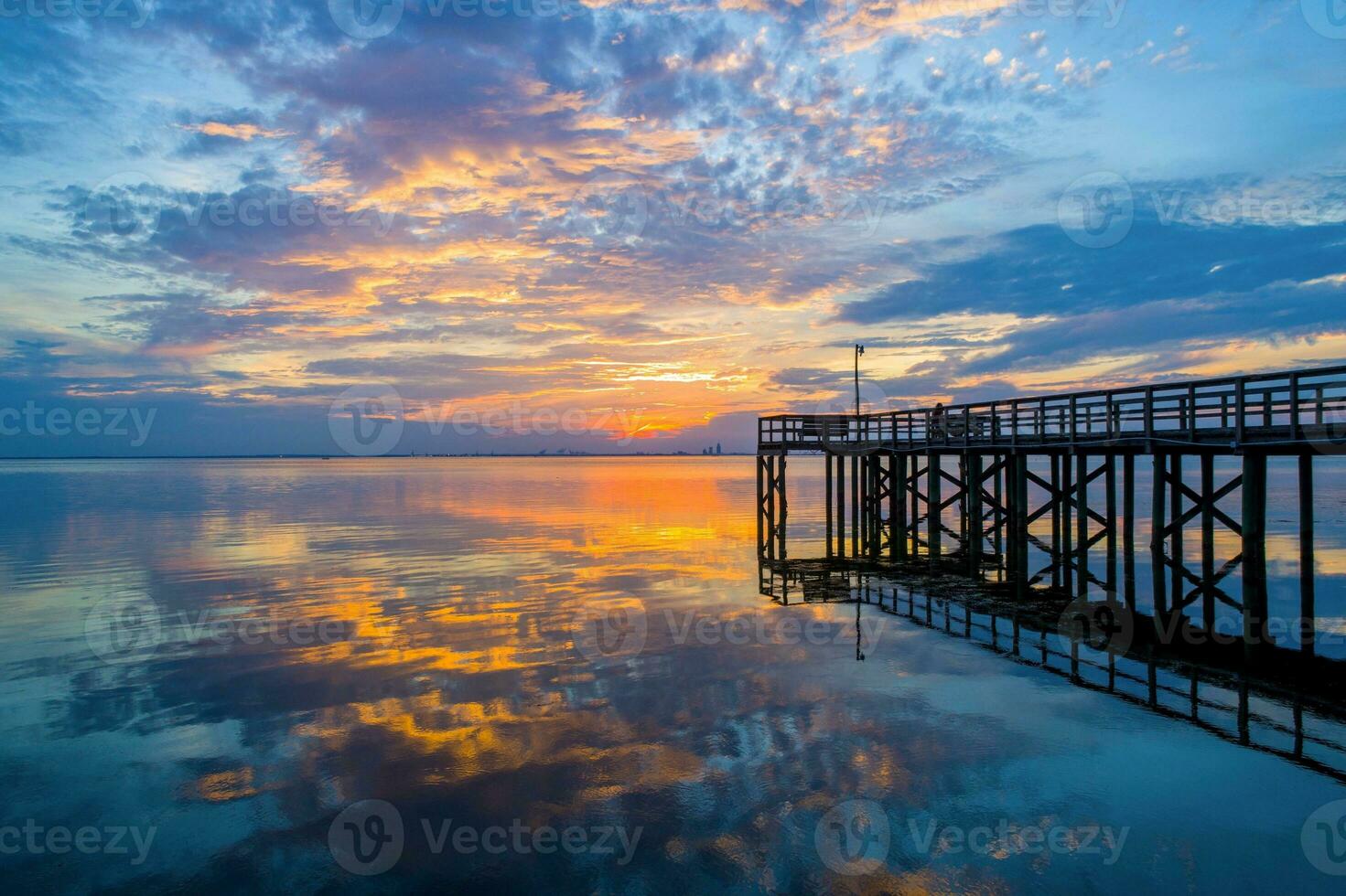 Beautiful sunset over Mobile Bay on the Alabama Gulf Coast photo