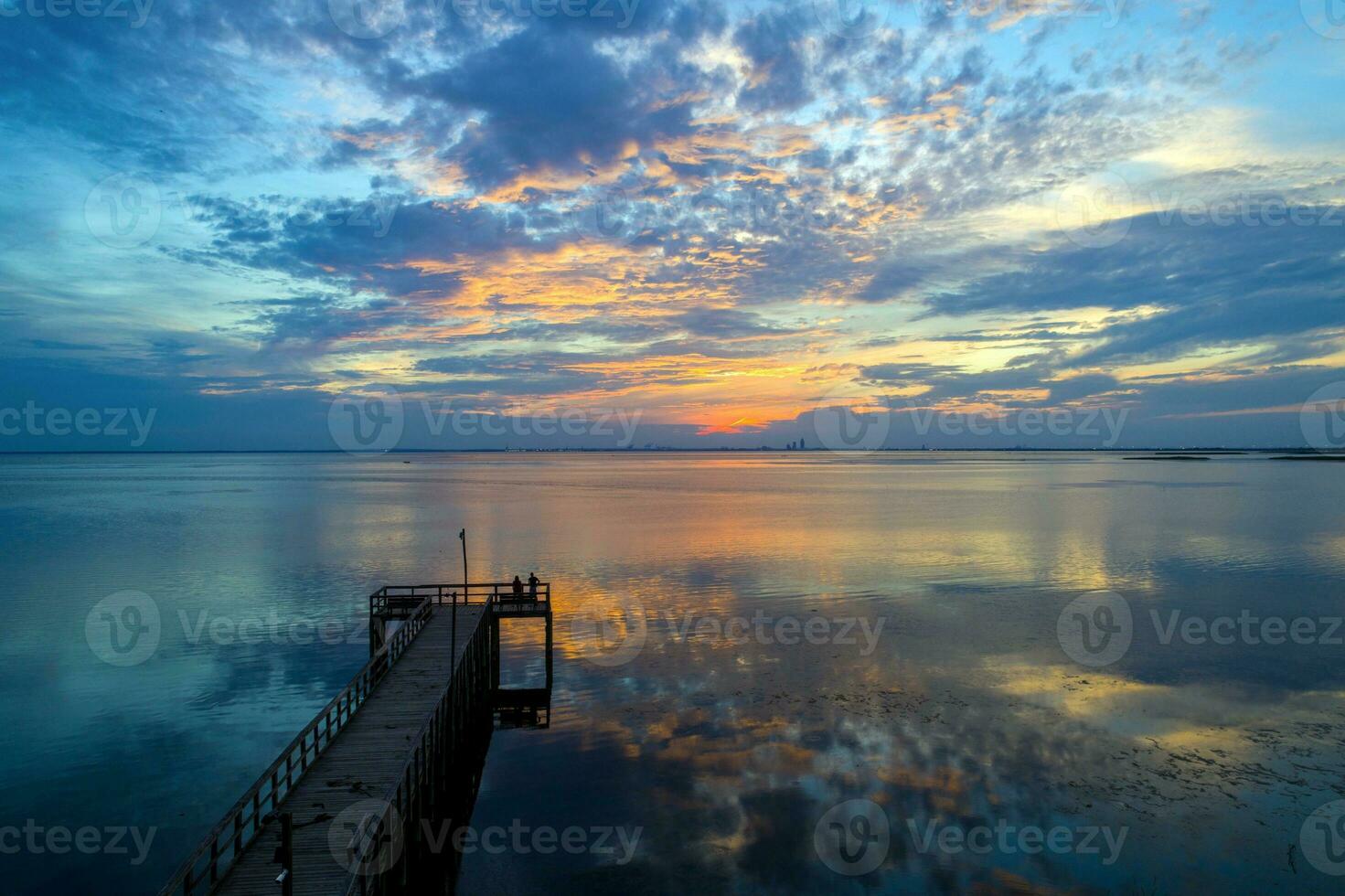 Beautiful sunset over Mobile Bay on the Alabama Gulf Coast photo