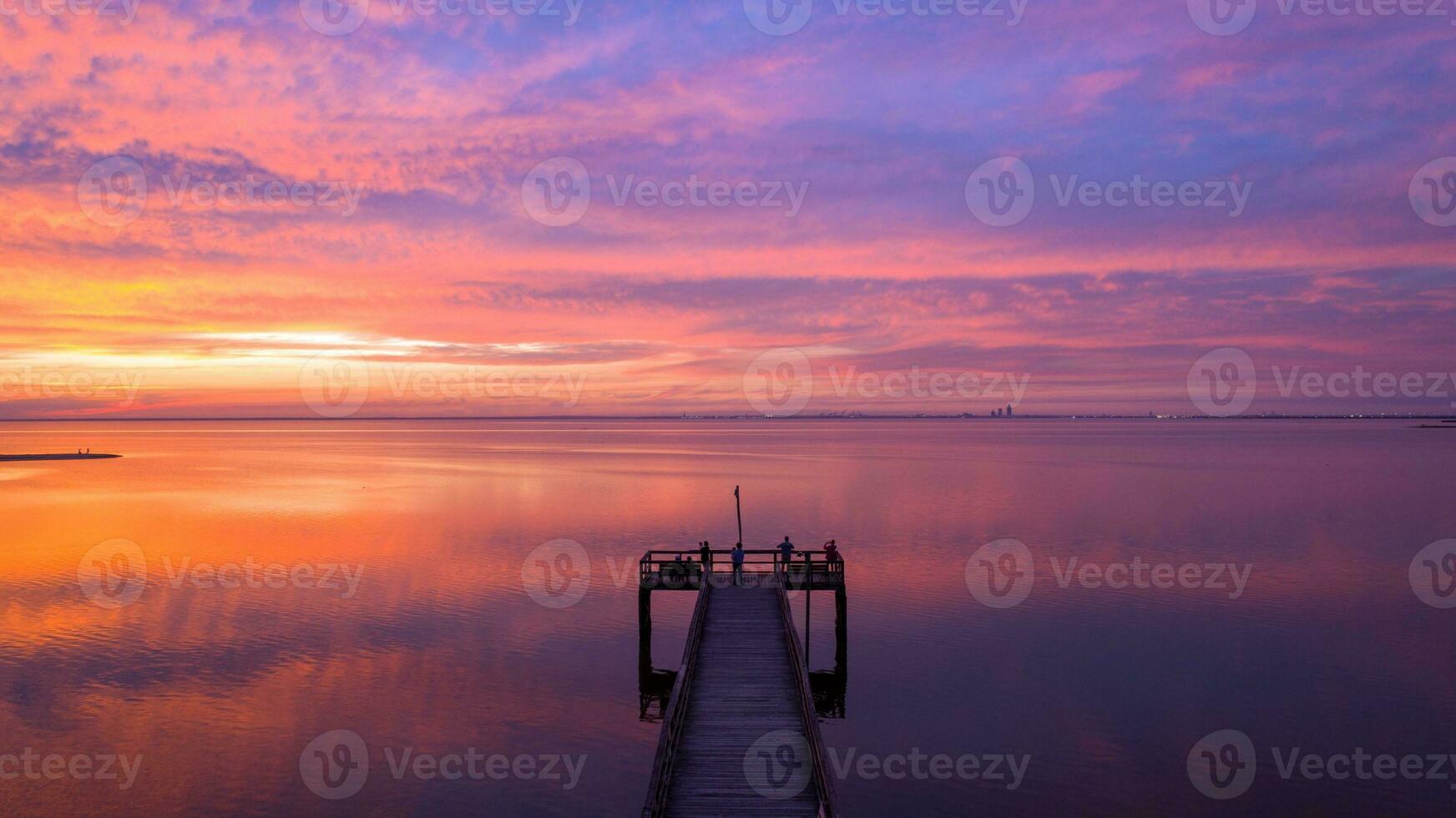 Beautiful sunset over Mobile Bay on the Alabama Gulf Coast photo