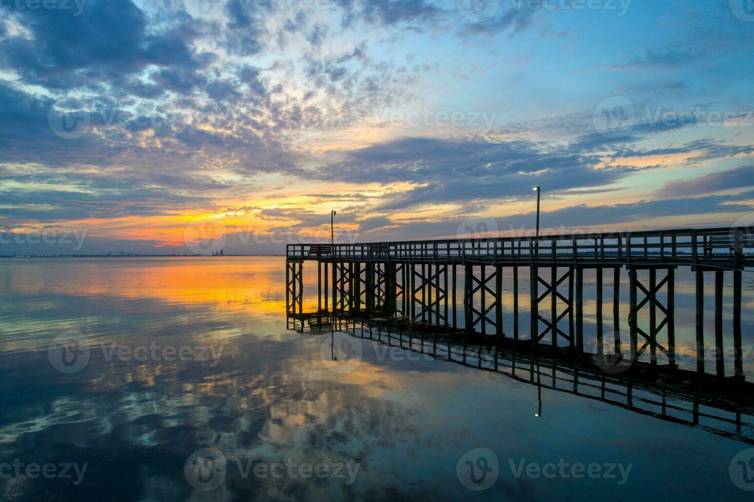 Beautiful sunset over Mobile Bay on the Alabama Gulf Coast photo