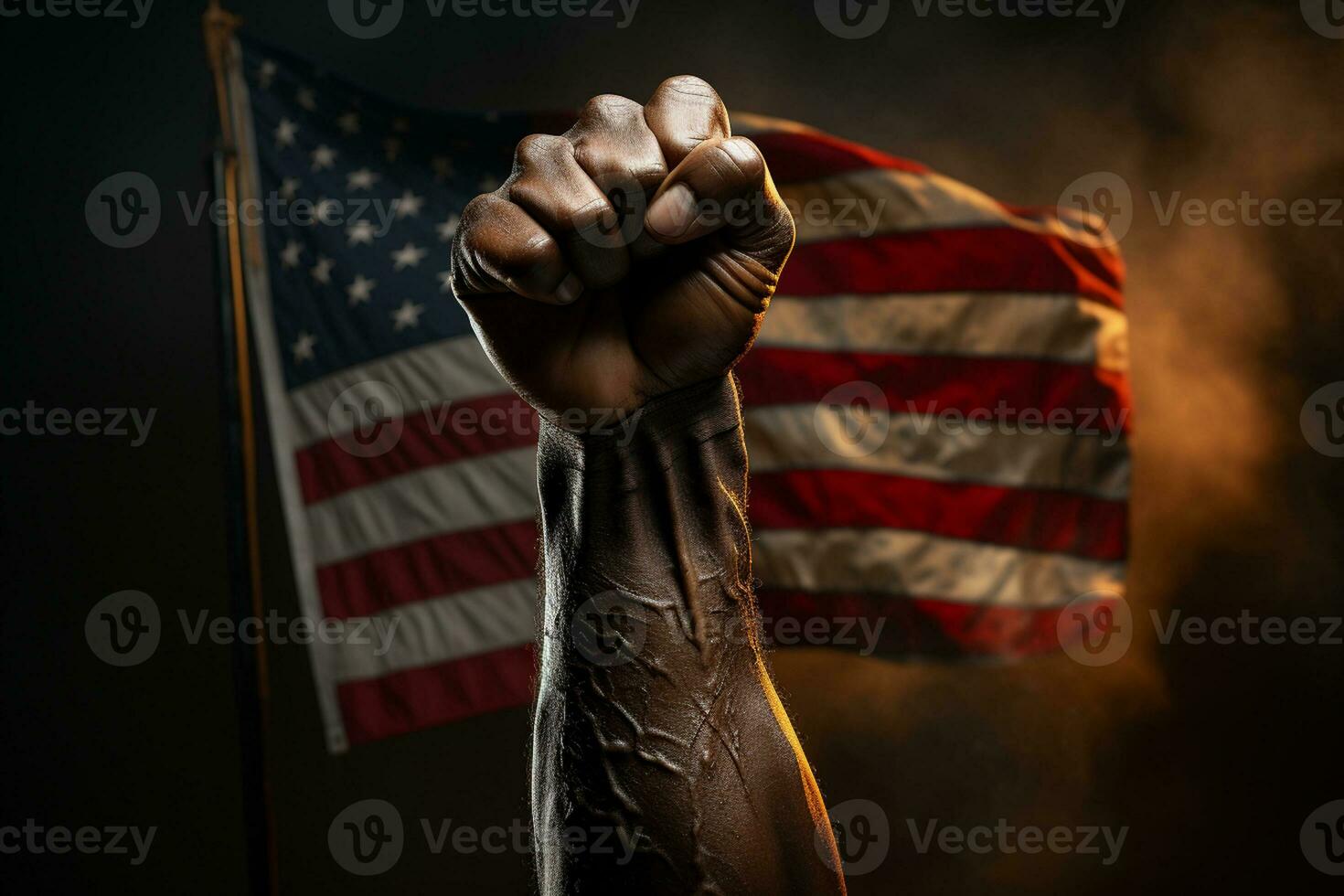 black fist raised in the front of the American flag photo