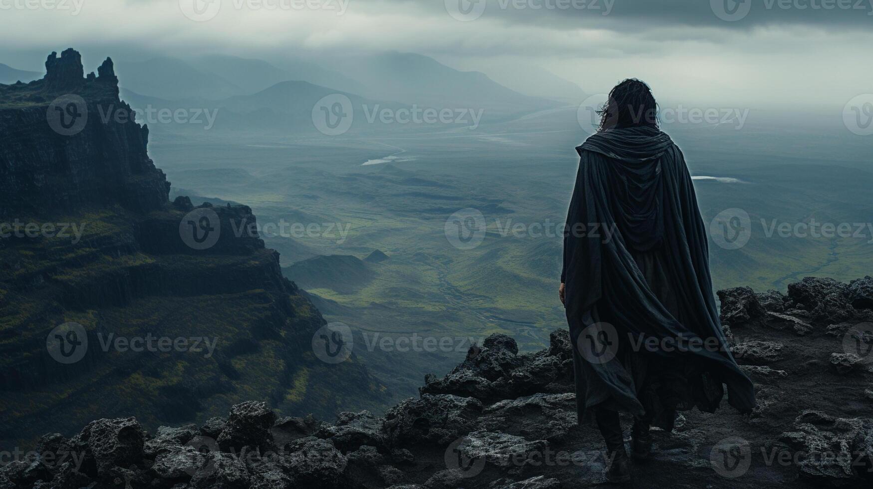 AI Generative A hooded warrior man stands atop a rugged mountain peak photo