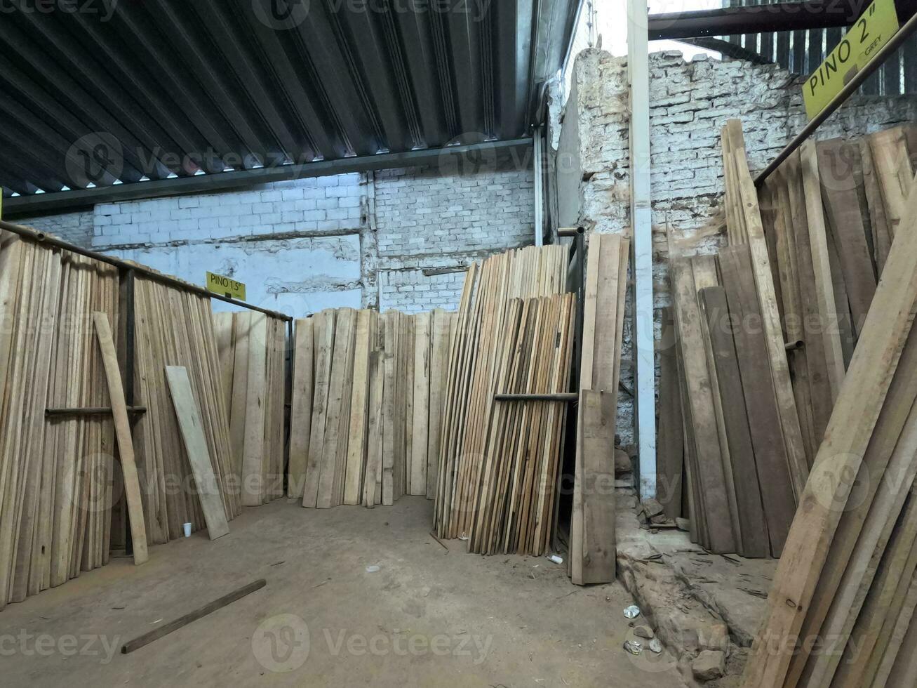 Lumber with vertical boards of tropical wood photo