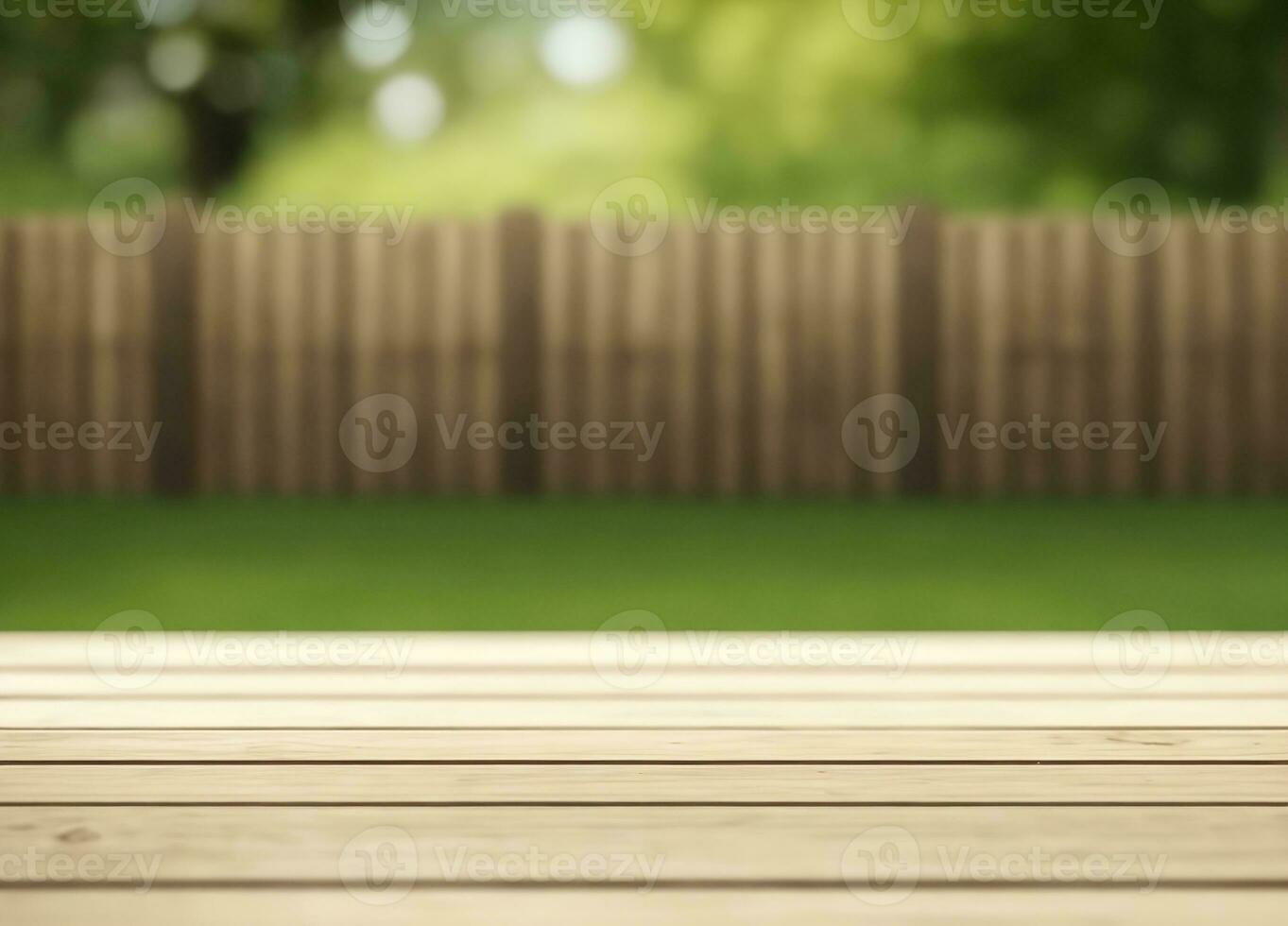 Wooden table with blurred garden and house fence background photo