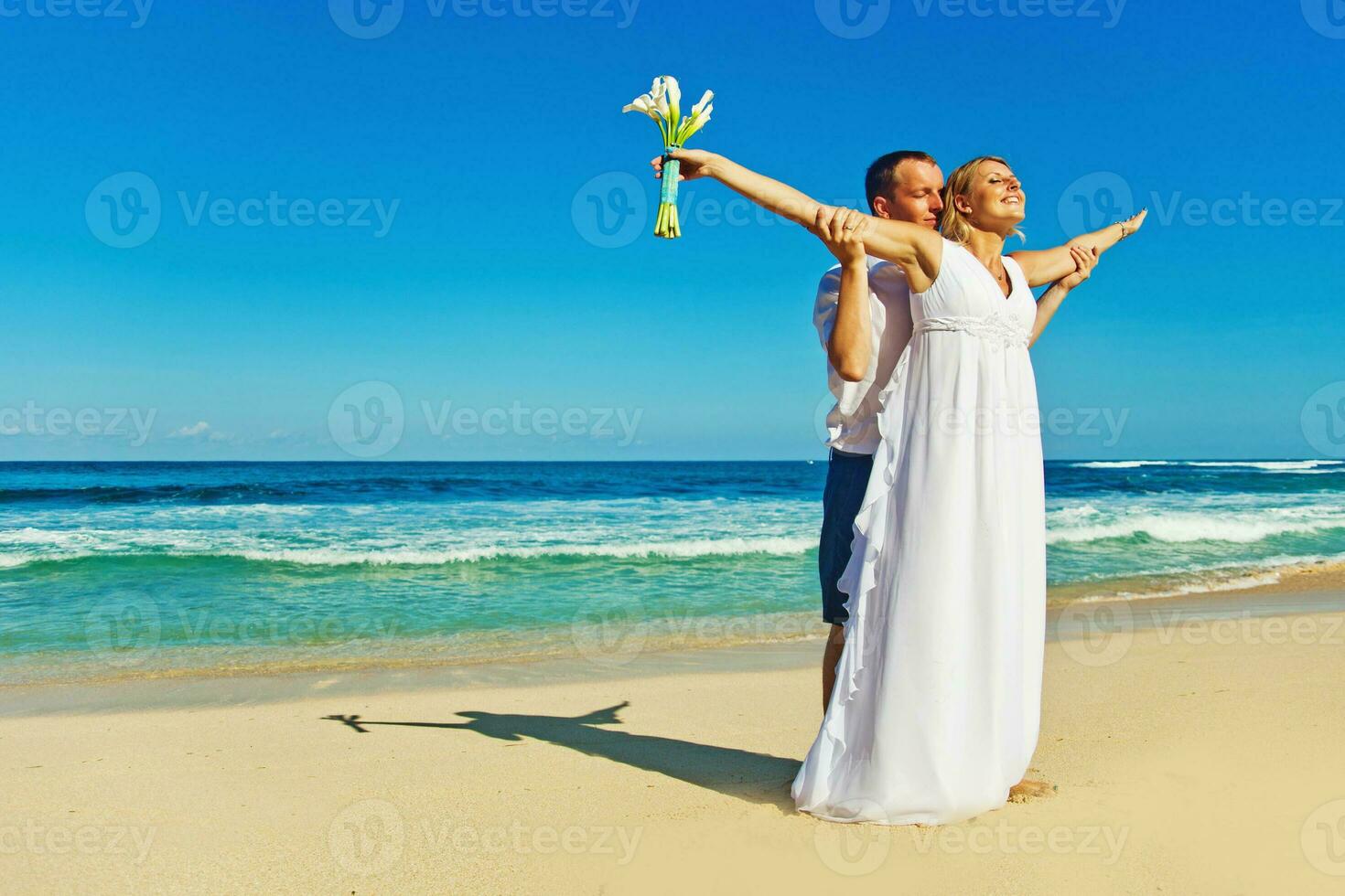 Beautiful, happy newly married couple photo