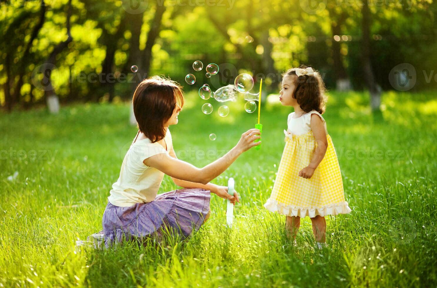 Mother and daughter in the park photo