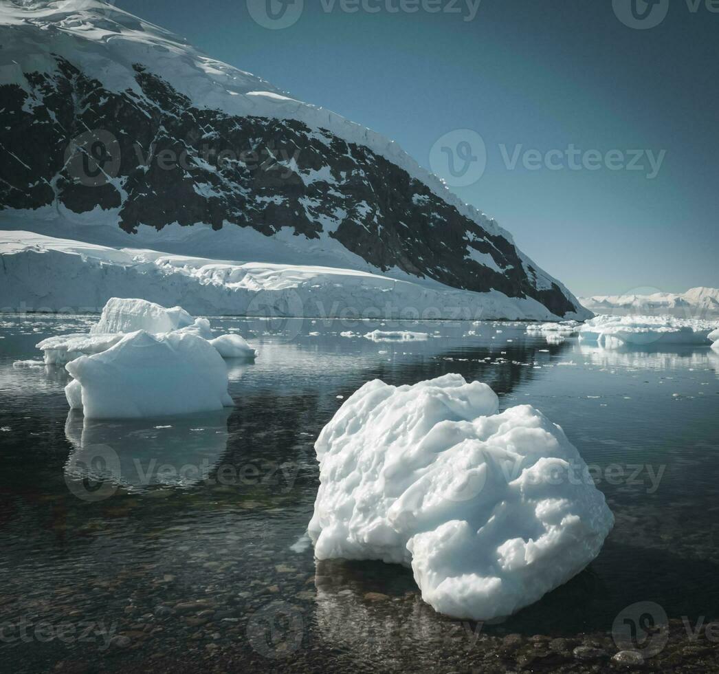 Piece of ice stranded on the beach in Neko Harbour,Antarctica. photo