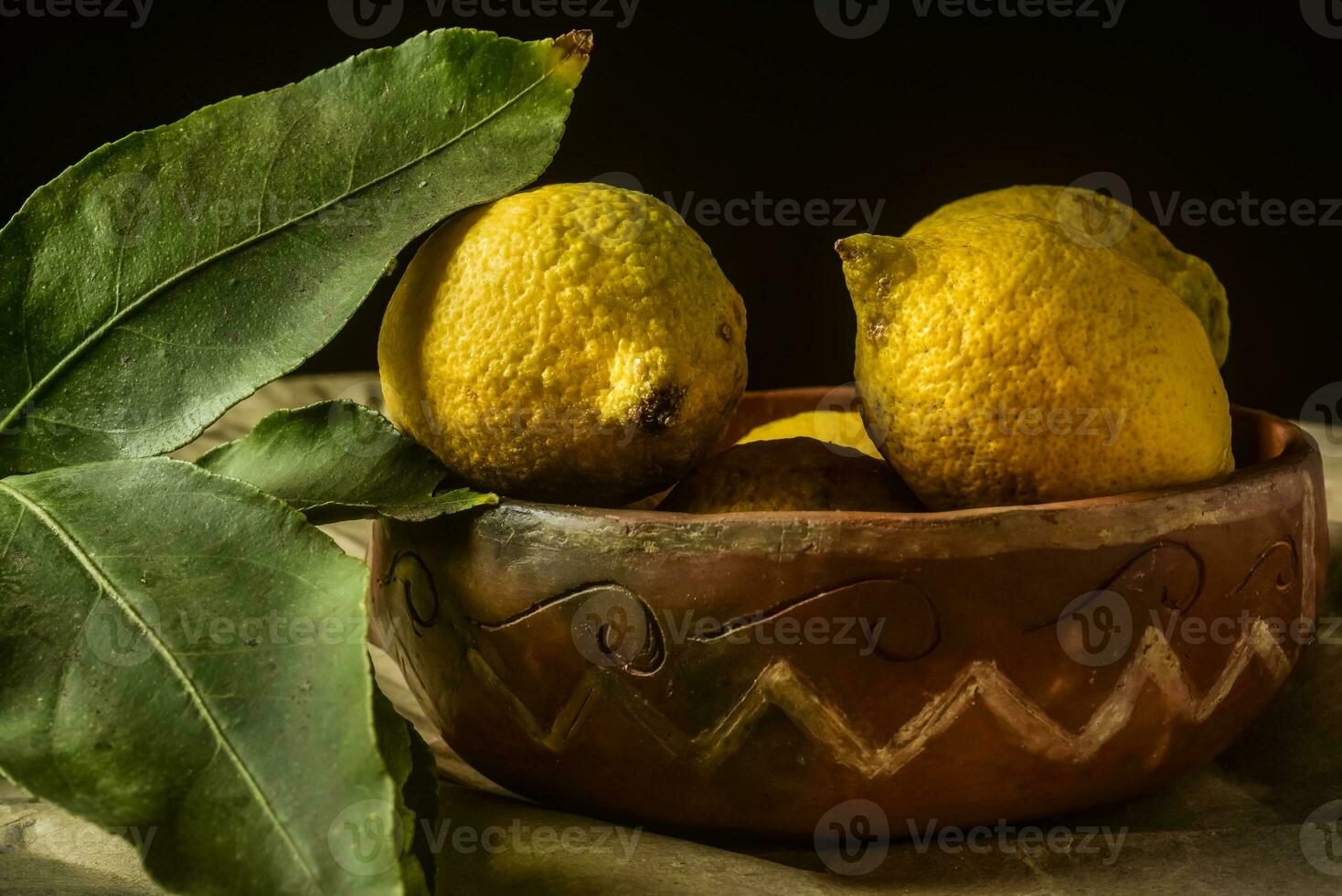 Organic lemons, harvested from the garden, prepared on the table. photo