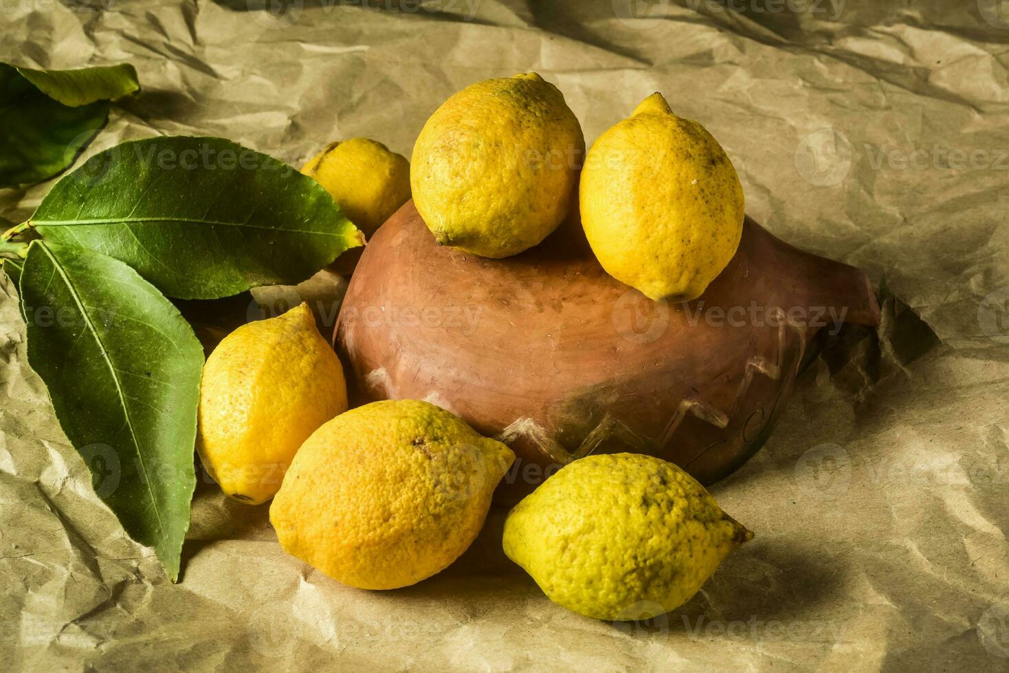 Organic lemons, harvested from the garden, prepared on the table. photo