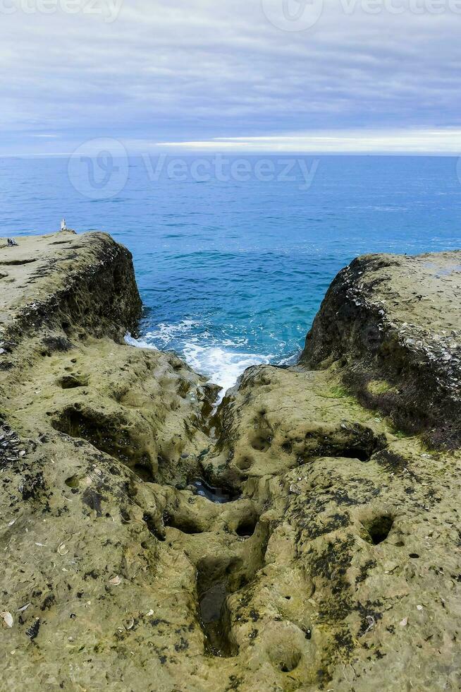 Coastal landscape with cliffs in Peninsula Valdes, World Heritage Site, Patagonia Argentina photo