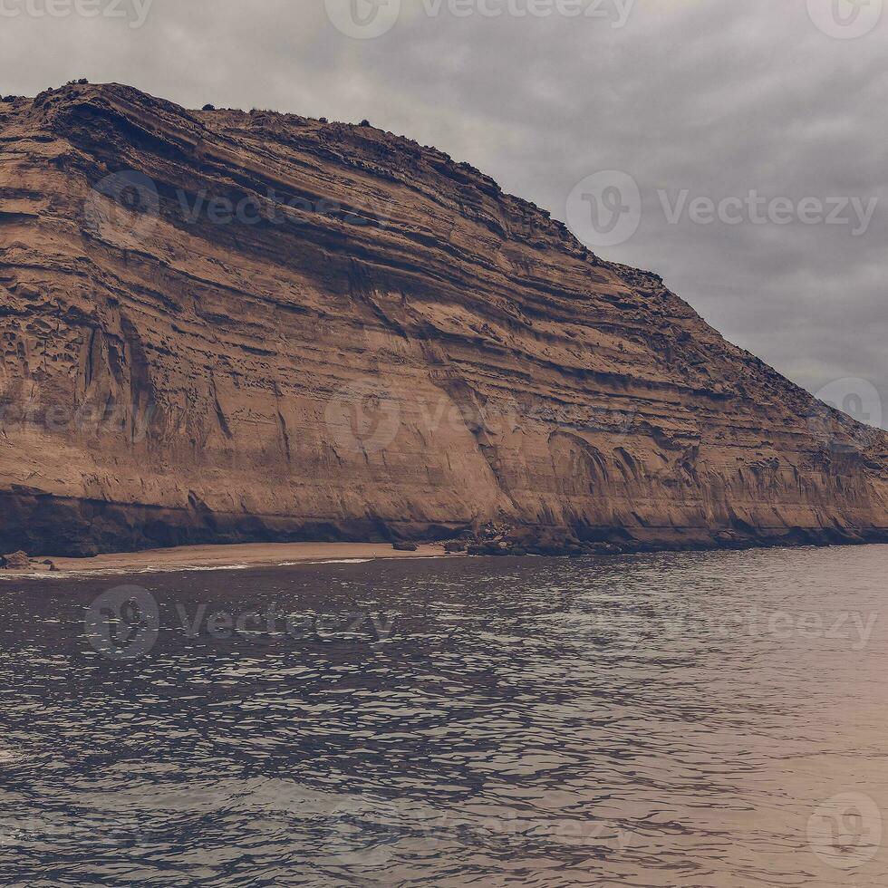 Coastal landscape with cliffs in Peninsula Valdes, World Heritage Site, Patagonia Argentina photo