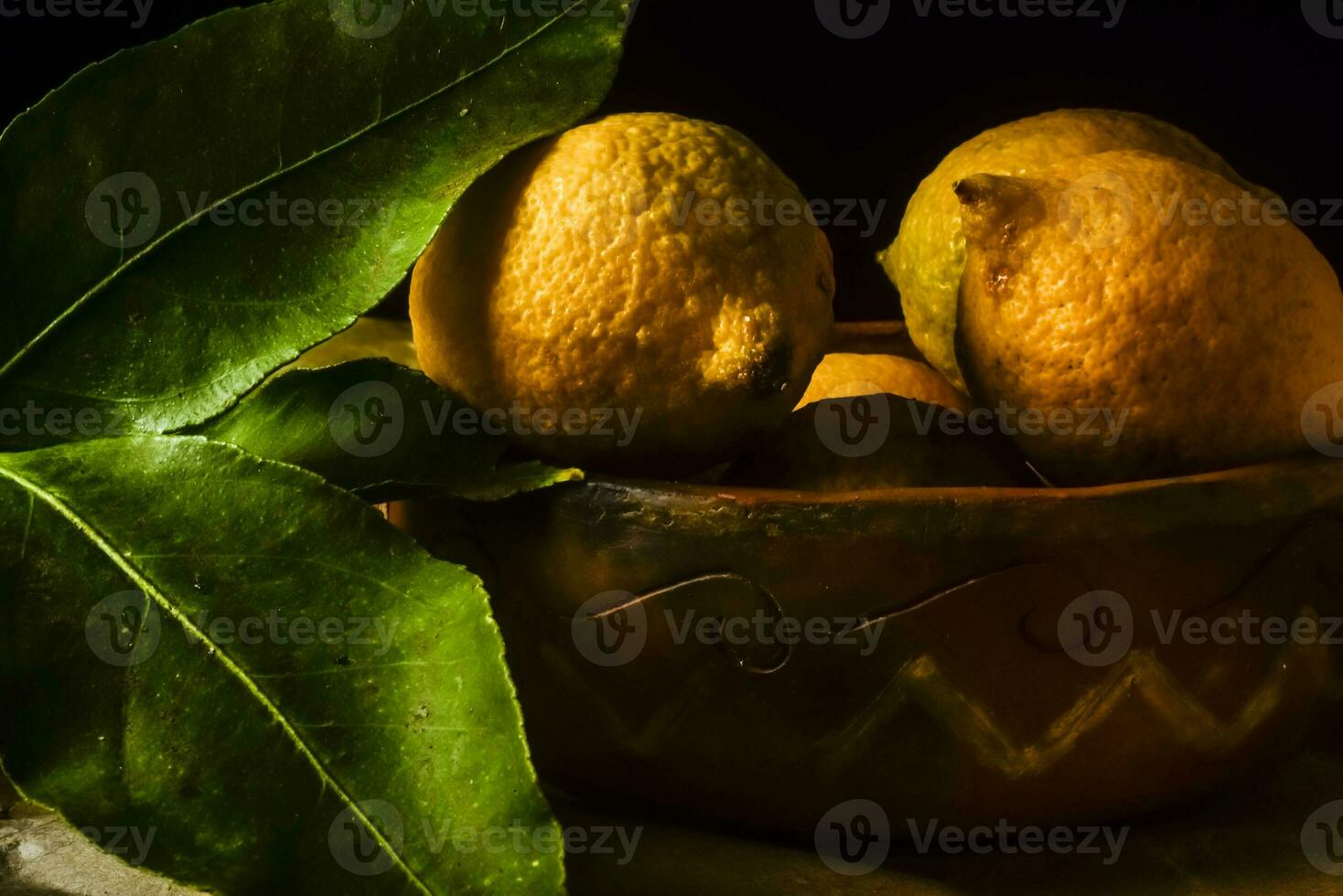 Organic lemons, harvested from the garden, prepared on the table. photo