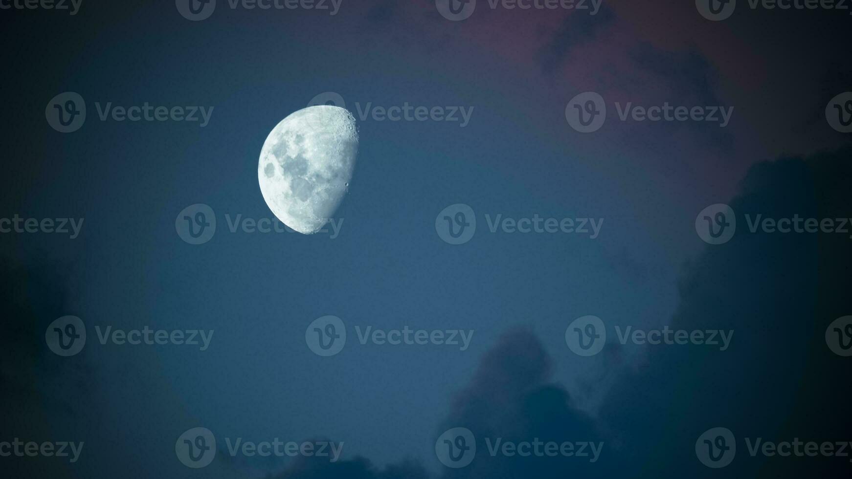 Moon in a sky with clouds,Patagonia Argentina photo