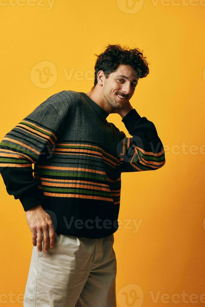 Style man happy smile yellow fashion background orange student portrait trendy sweater stylish photo