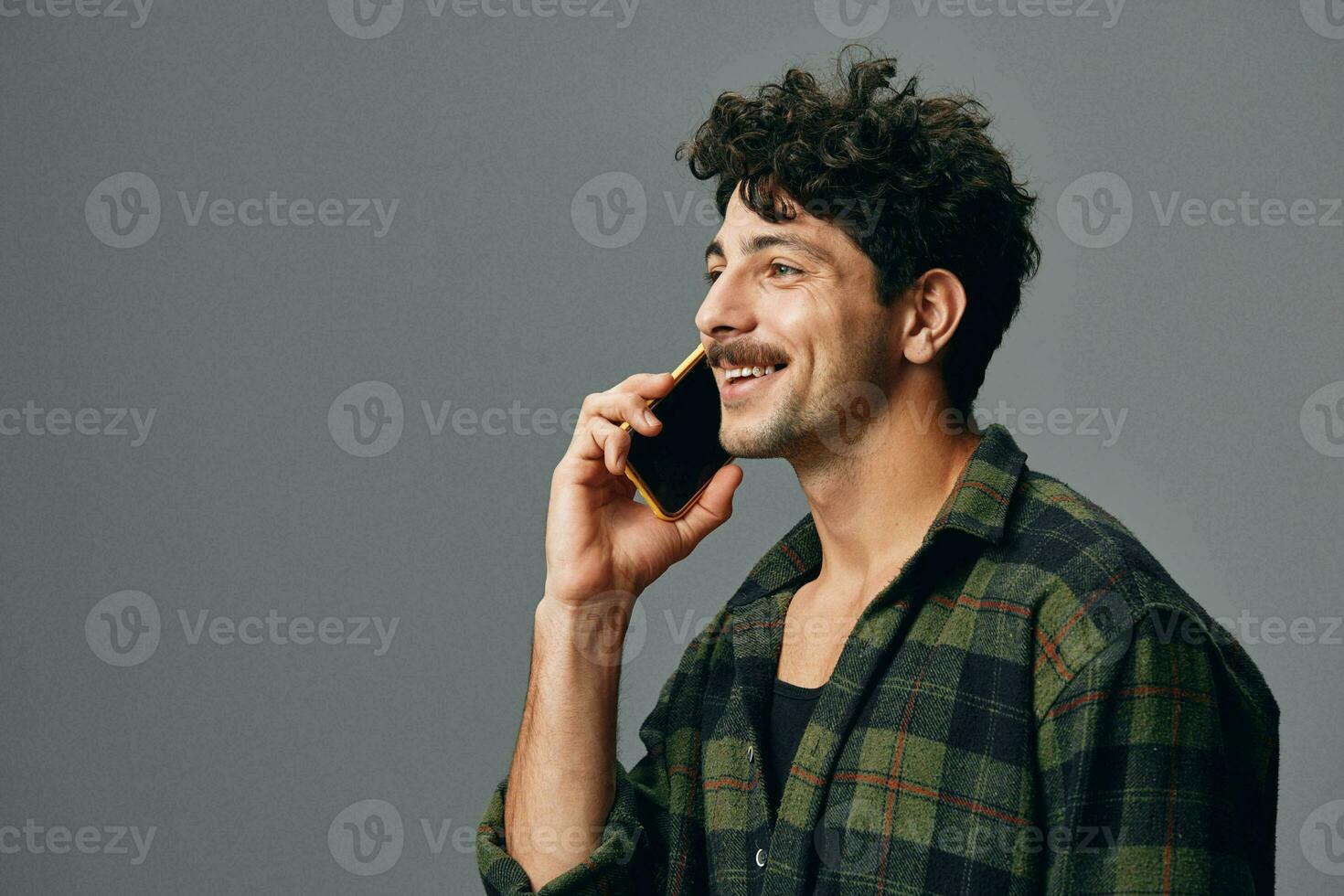 Happy man guy studio smile stylish background technology phone grey caucasian lifestyle photo