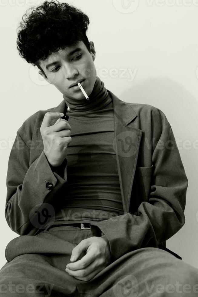 Man portrait and cigarette white smoking black fashion photo
