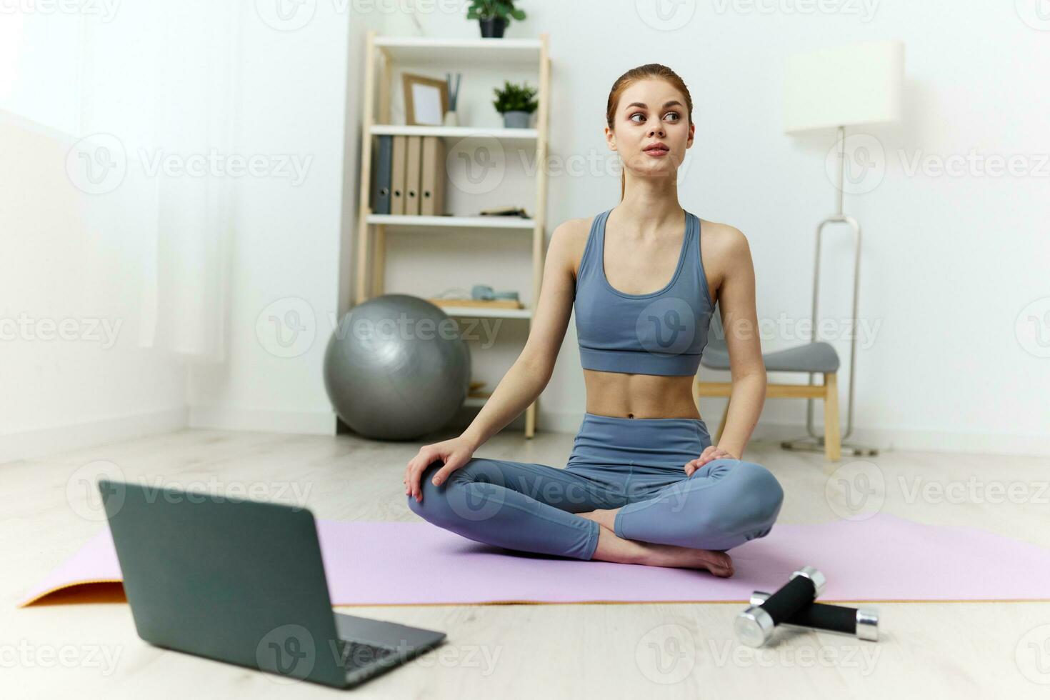 woman home yoga lotus space mat lifestyle training health laptop copy video photo