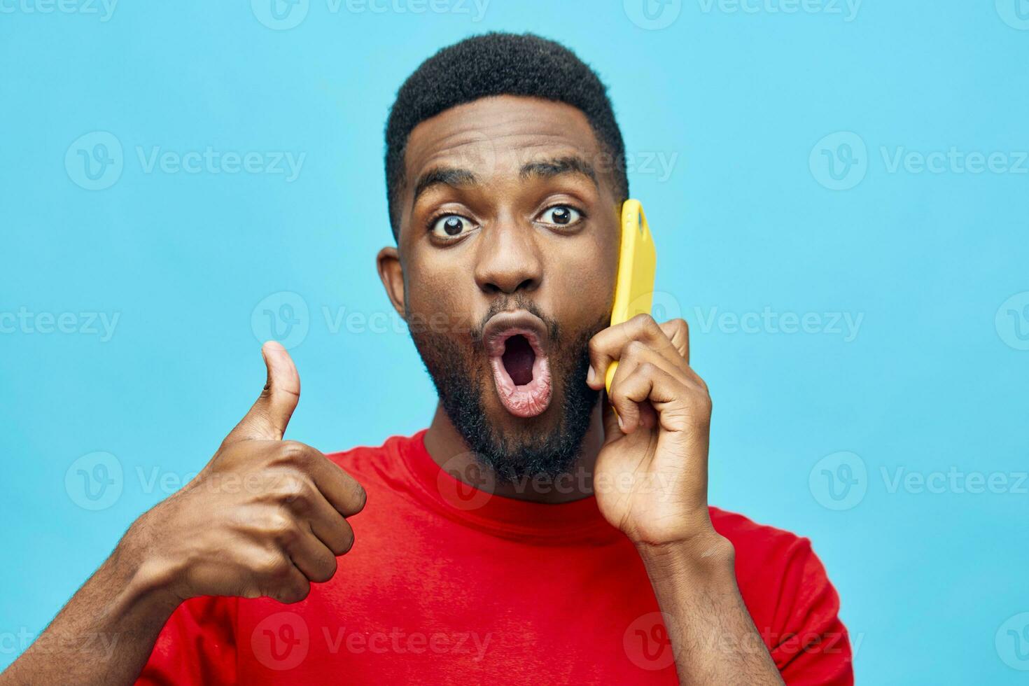 man happy blank black showing african technology young background phone smile mobile photo