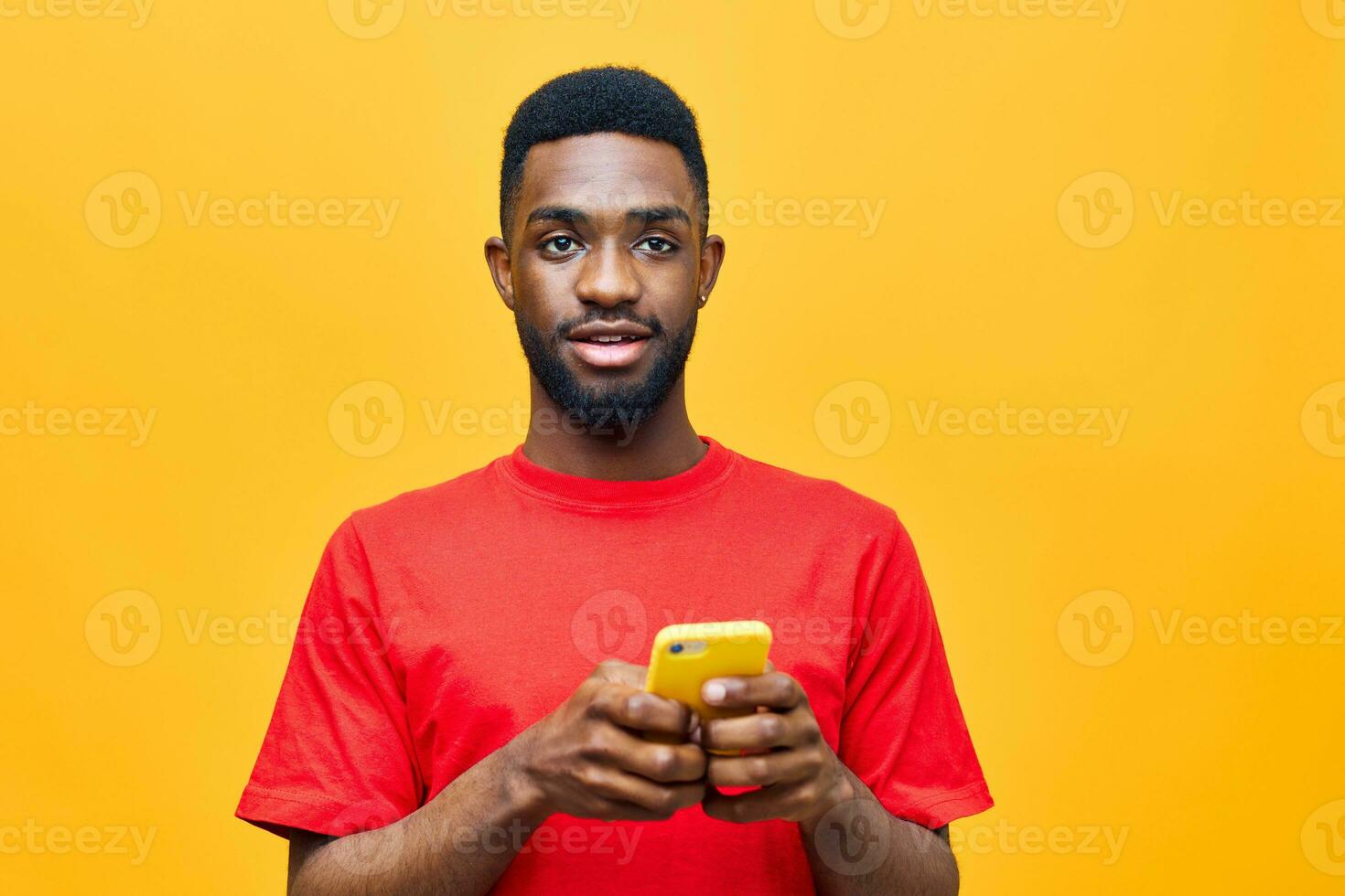 young man background internet black technology yellow mobile african happy business phone photo