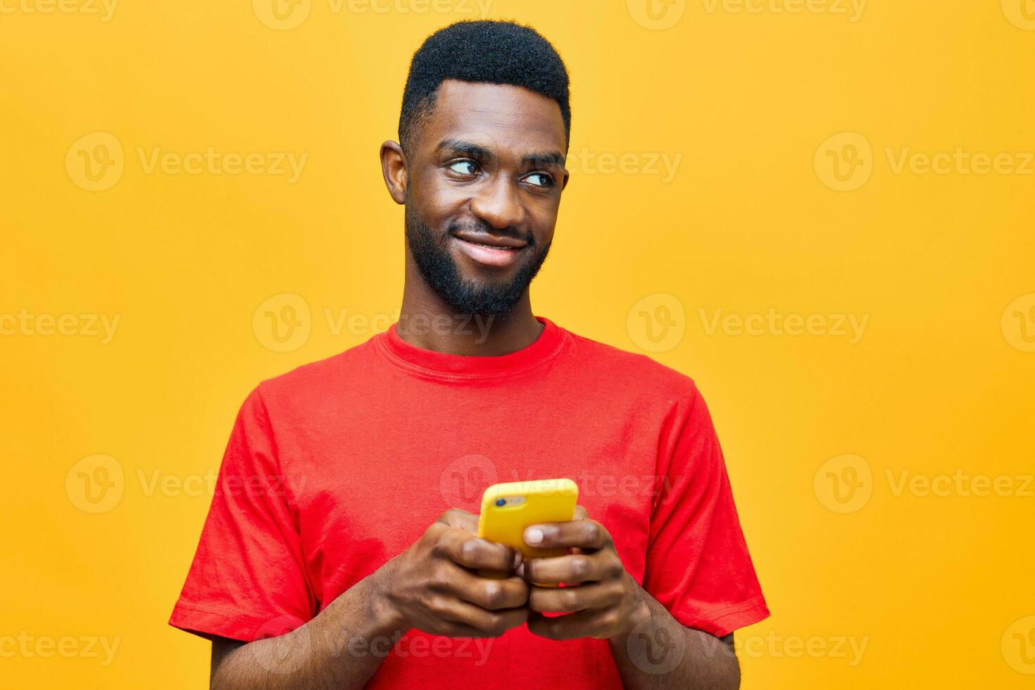 phone man background technology black yellow colorful happy young cyberspace mobile african photo